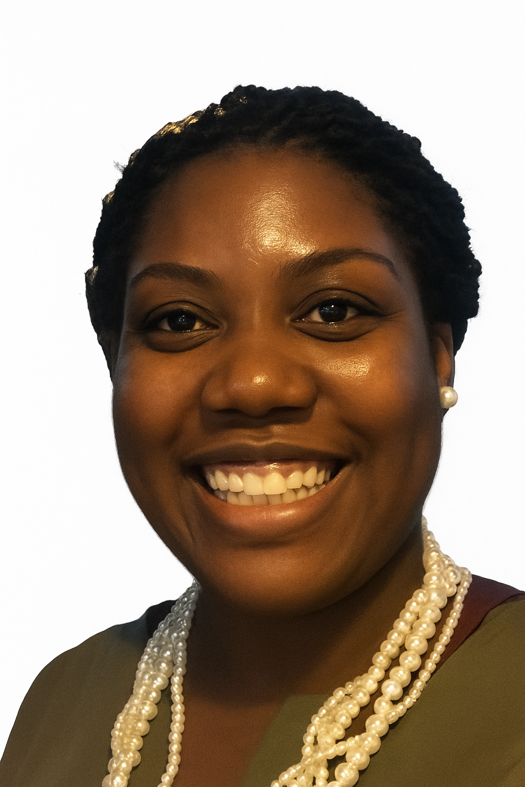 Close-up of a smiling woman with short, braided hair, wearing pearl earrings and multiple pearl necklaces, against a plain white background.