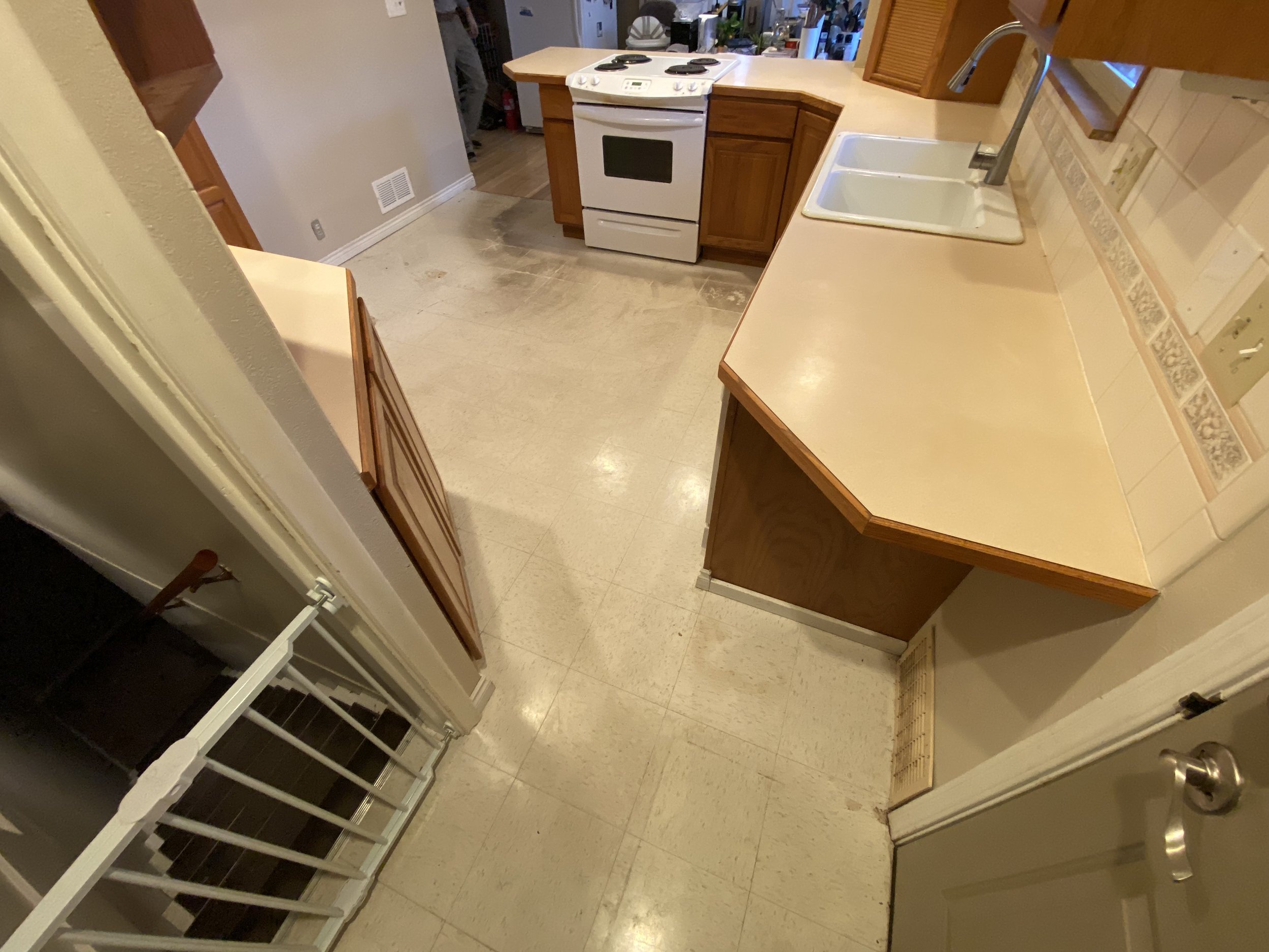 Another view of old floor (There was 4 layers of flooring on top of each other)