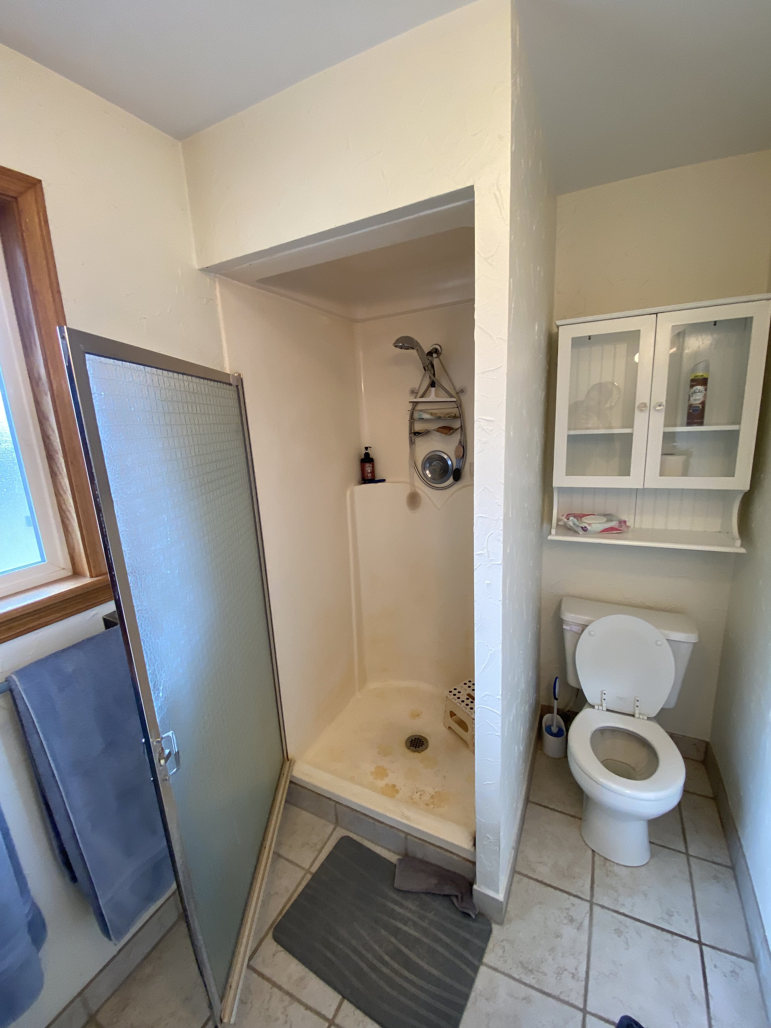 The old fiberglass shower we'll be updating