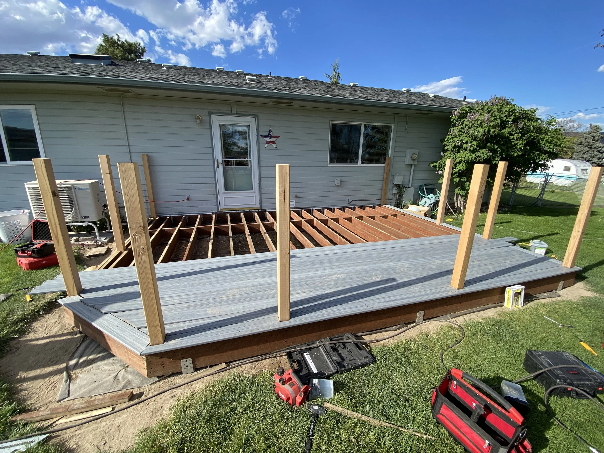 Framing complete, now installing Trex deck boards, and posts for railing installation 