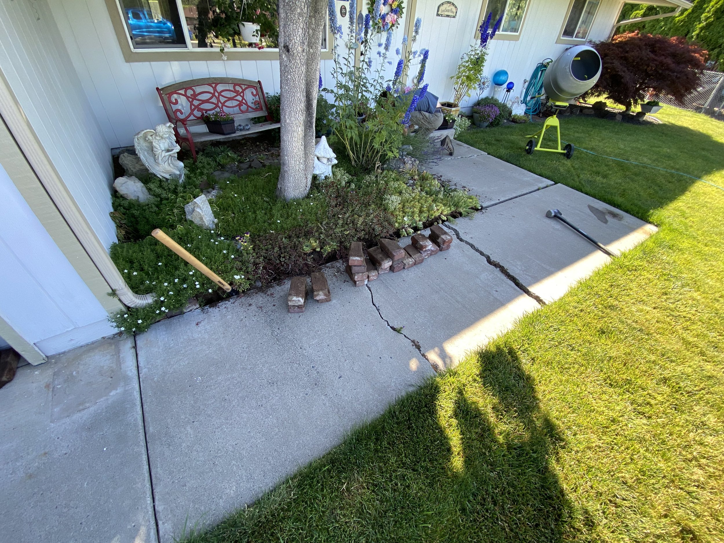Customer wants new pathway from the drive to their front door. Old pathway was pretty cracked and lifting.