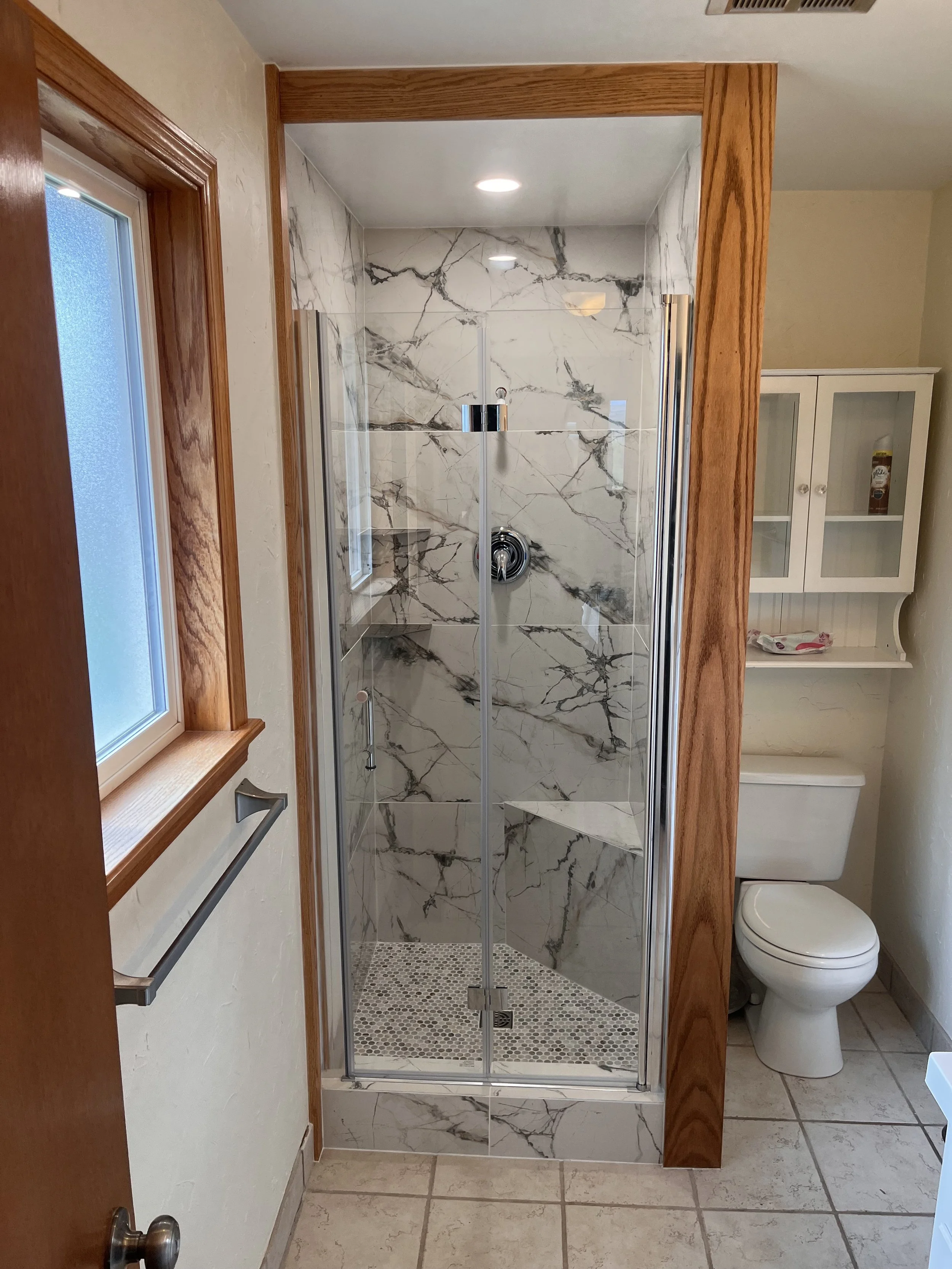 Finished product with overhead light, fixtures, and final sealant  