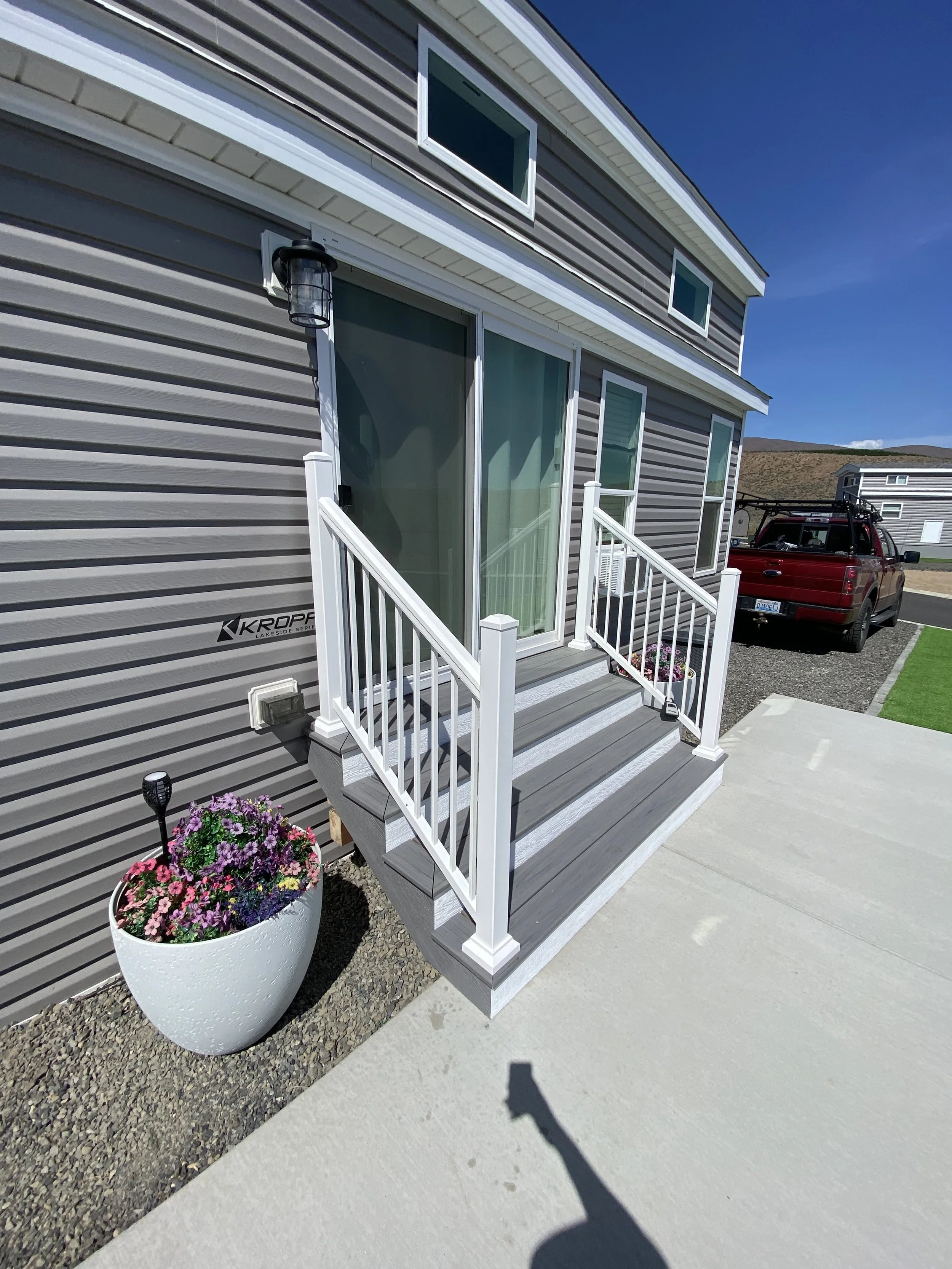Finished product with Trex boards and railing (left side)