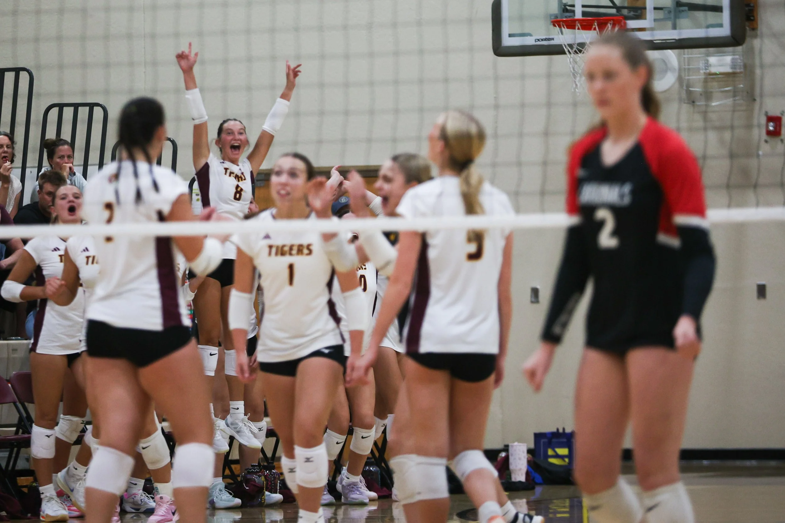 Stewartville's Olivia Hamilton cheers for her teammates from the sidelines during a match against Bethlehem Academy on Monday, Aug. 25, 2025 in Stewartvillle. (Post Bulletin)