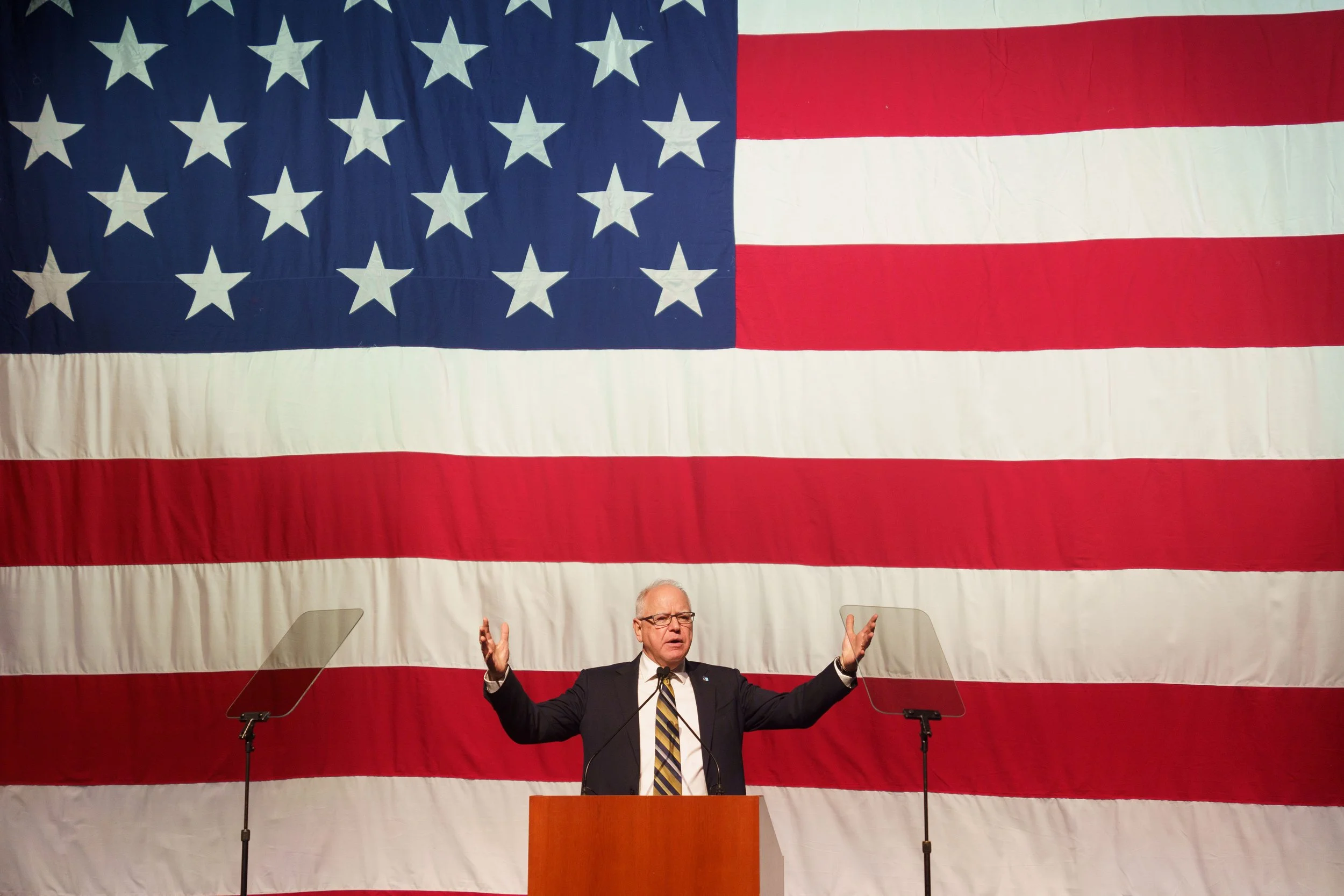 Gov. Tim Walz speaks to a crowd of family, friends and supporters for the first time following Tuesday's election results on Friday, Nov. 8, 2024 at Eagan High School in Eagan, Minn. (MPR News)