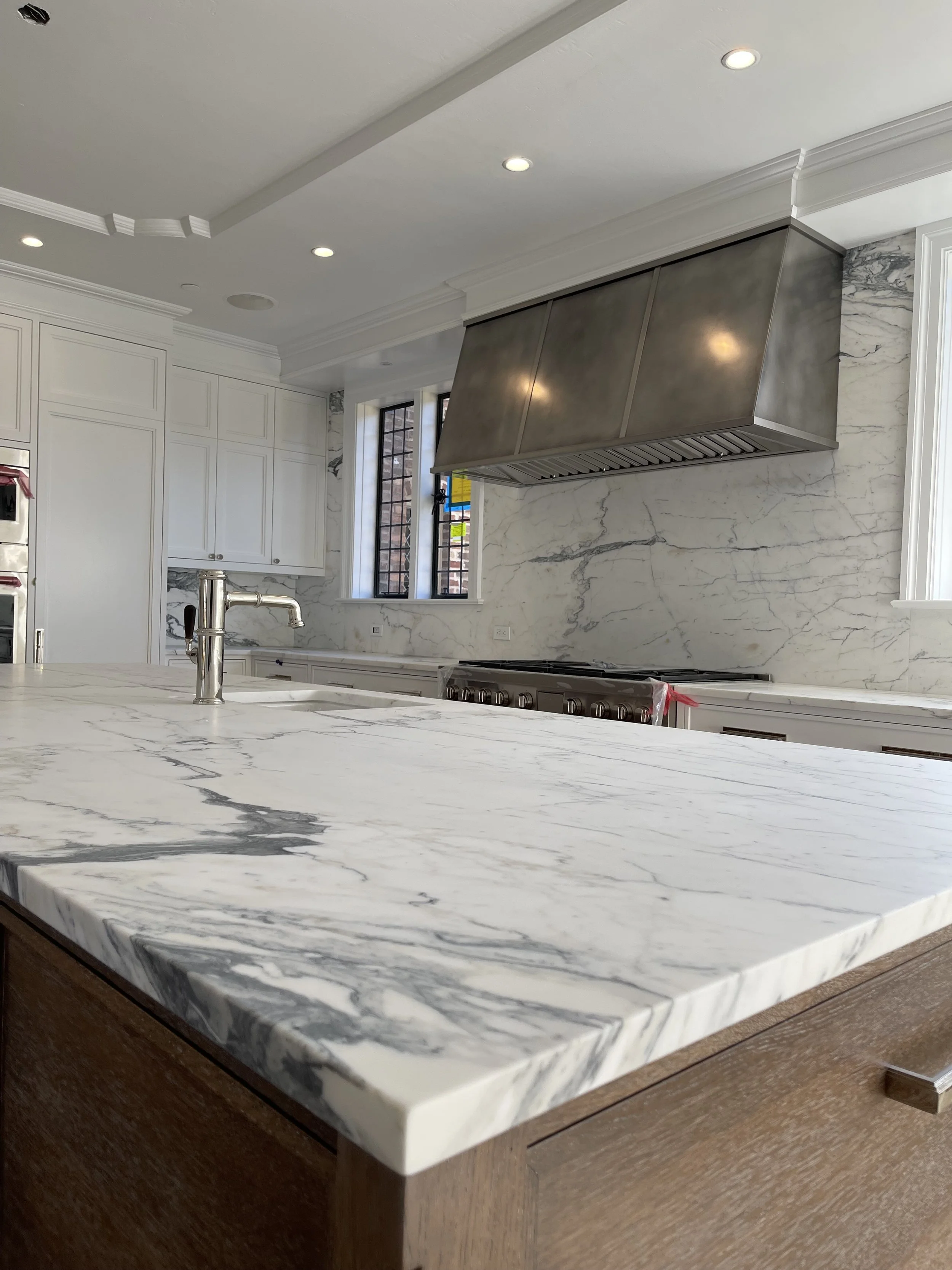 Calacata marble kitchen counters and backsplash