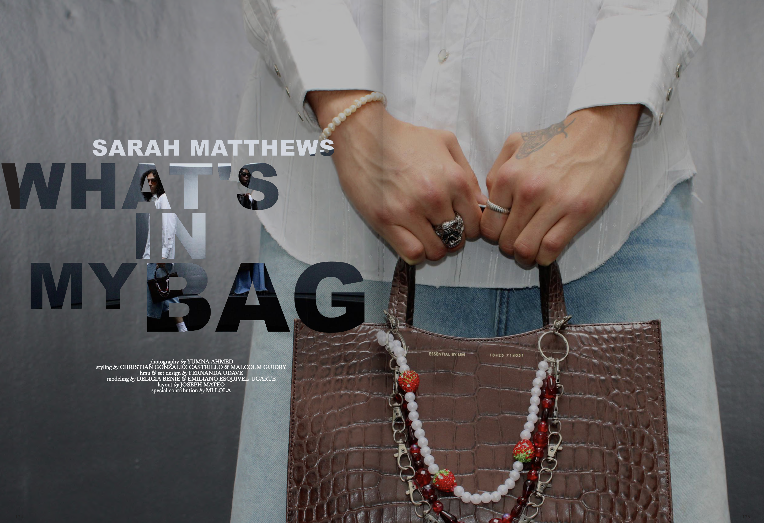 Close-up of a person's hands holding a brown textured handbag with jewelry, wearing a white long-sleeve shirt, jeans, and a pearl bracelet, with a textured gray wall in the background.