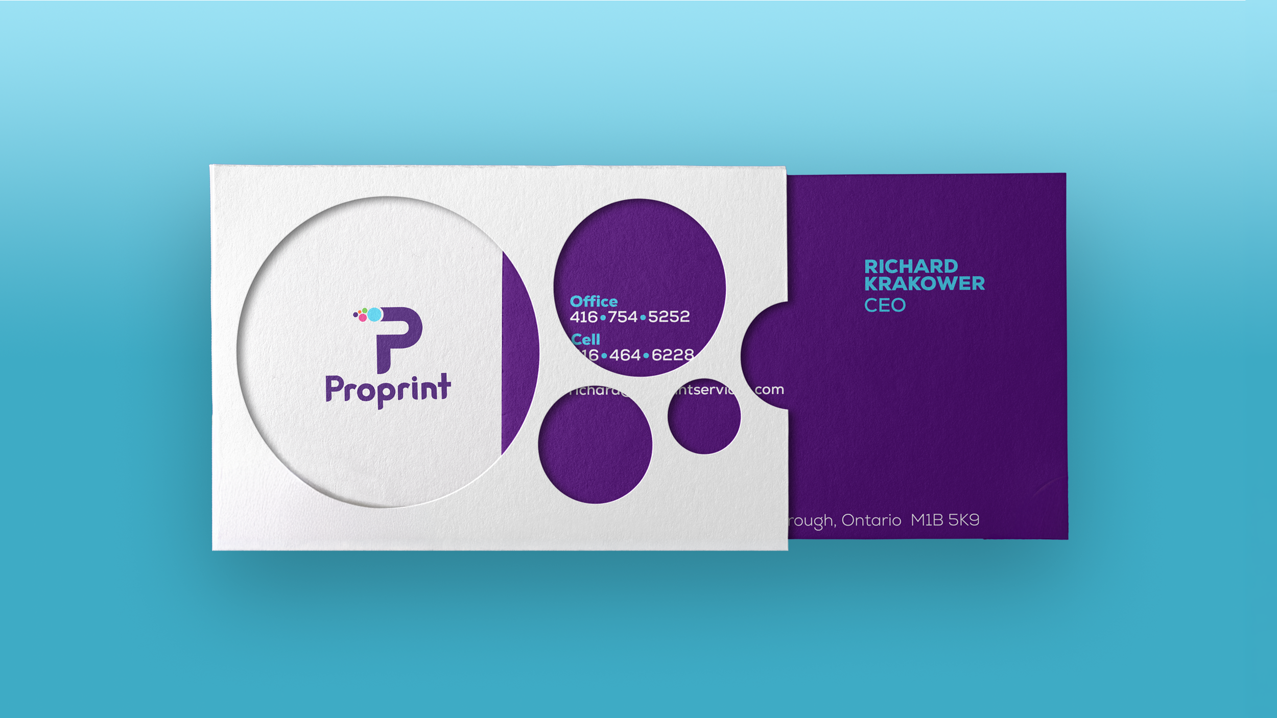 Proprint business card design featuring a custom die-cut sleeve with circular cutouts, a purple and white colour palette, and the company's visual identity.