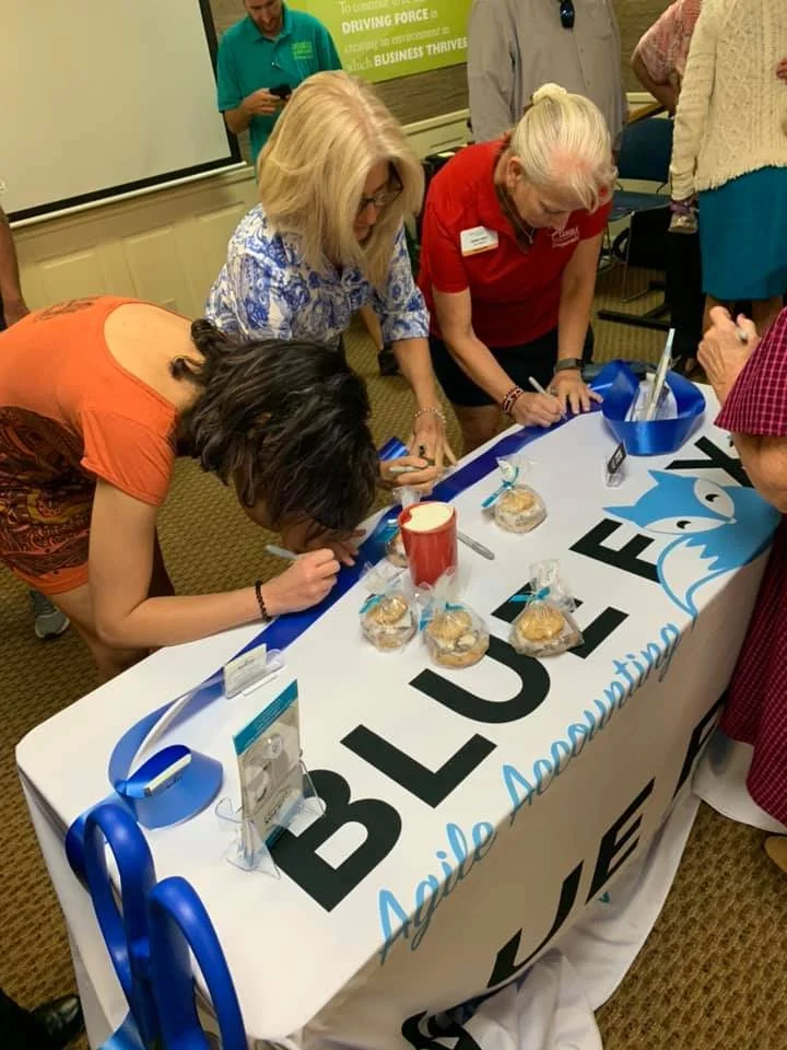 melbourne-regional-chamber-members-signing-blue-fox-ribbon_orig.jpg