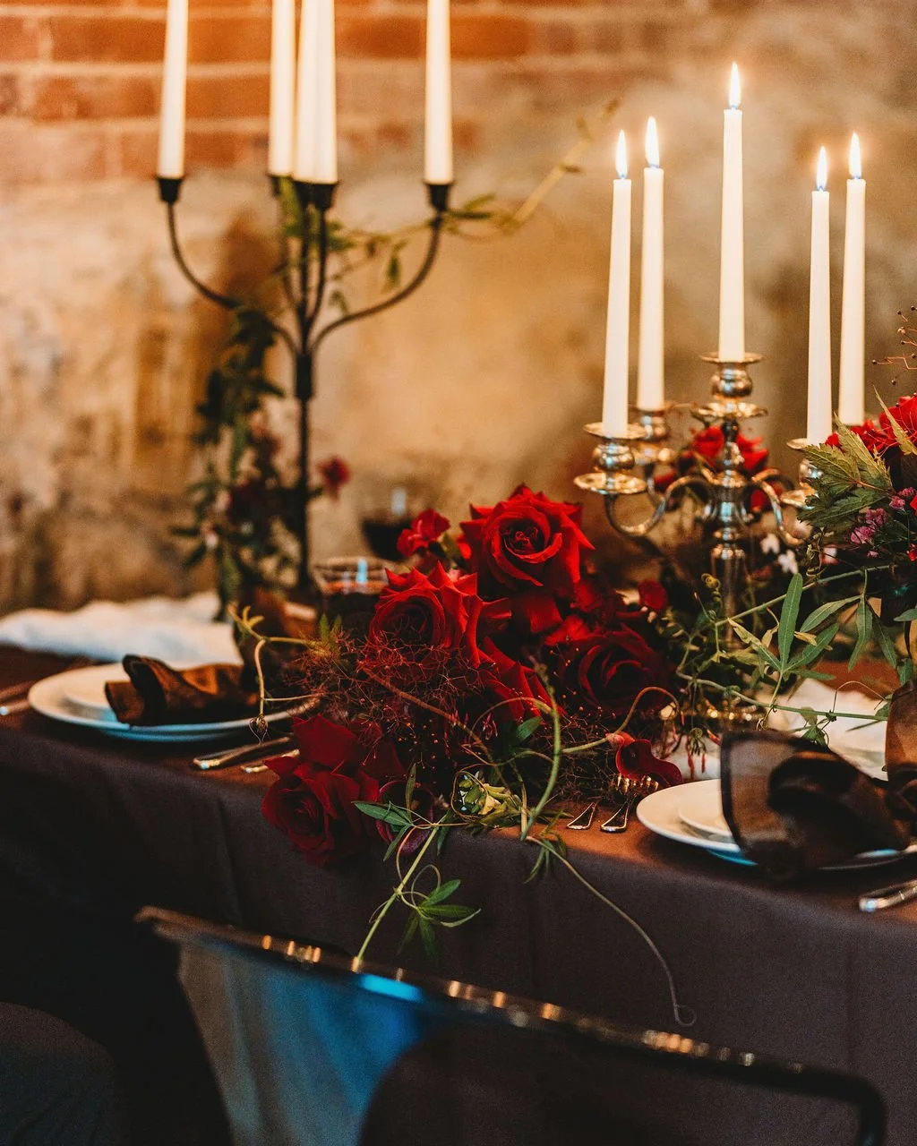 Set the scene. 🕯️🌹
The bouquet takes its place at the table for our Phantom of the Opera-inspired shoot. Every great production starts with the right details. 

📸: @chelsea_king_photography
Host &amp; Planning - @chelsea_king_photography
Host &amp