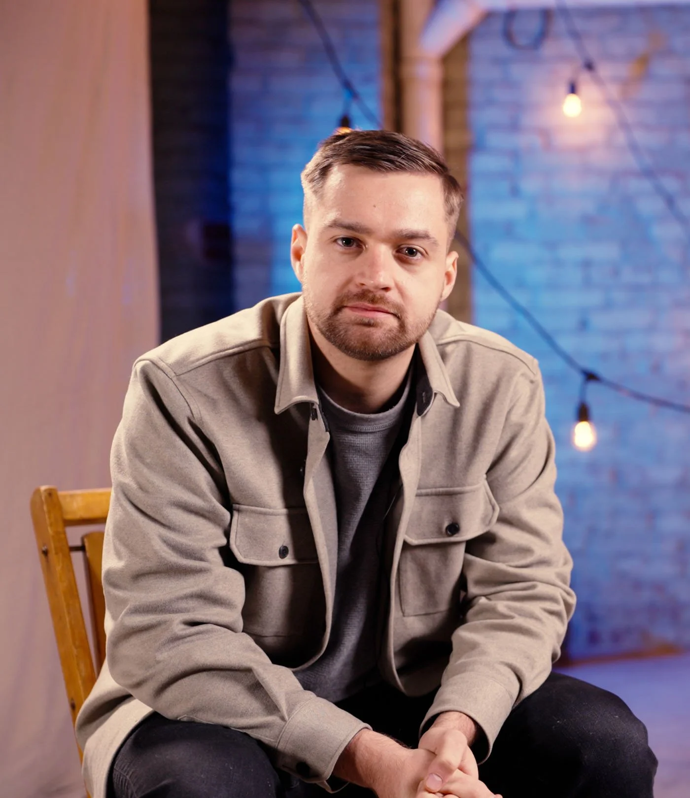 Nate Bergey, Founder and Chief Storyteller at Yondure. Sitting in a studio full of character, warmth and life.