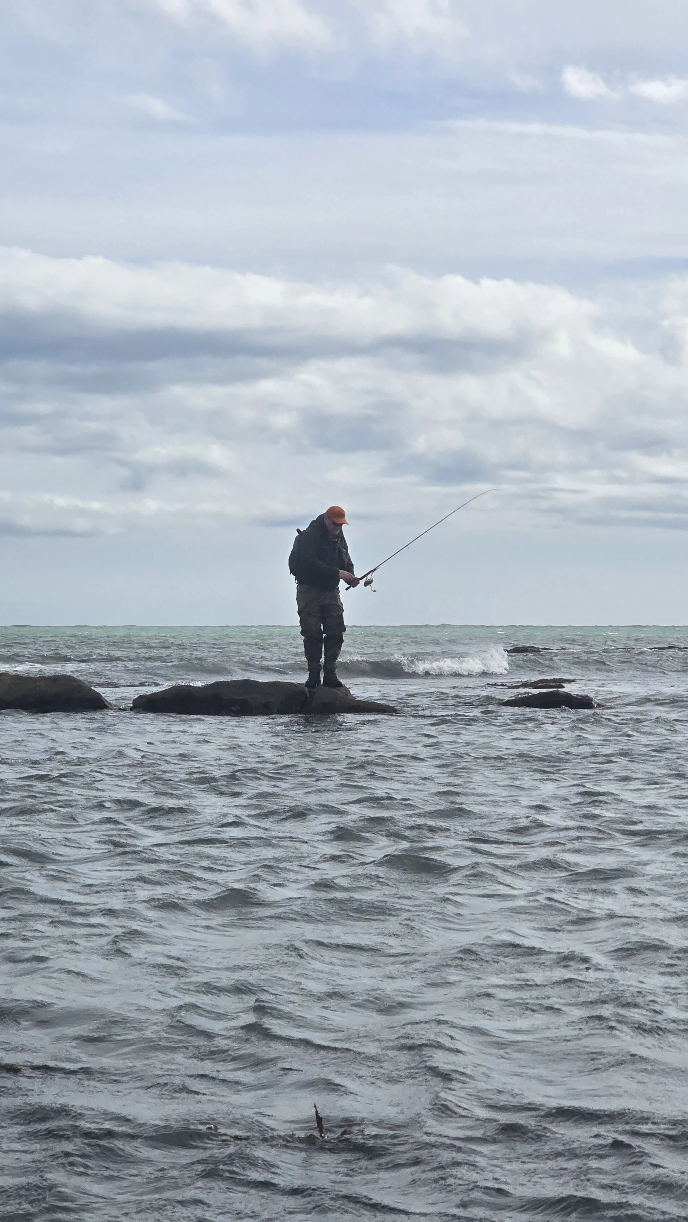 Angler navigating rocks on the open coast in Wexford.jpg