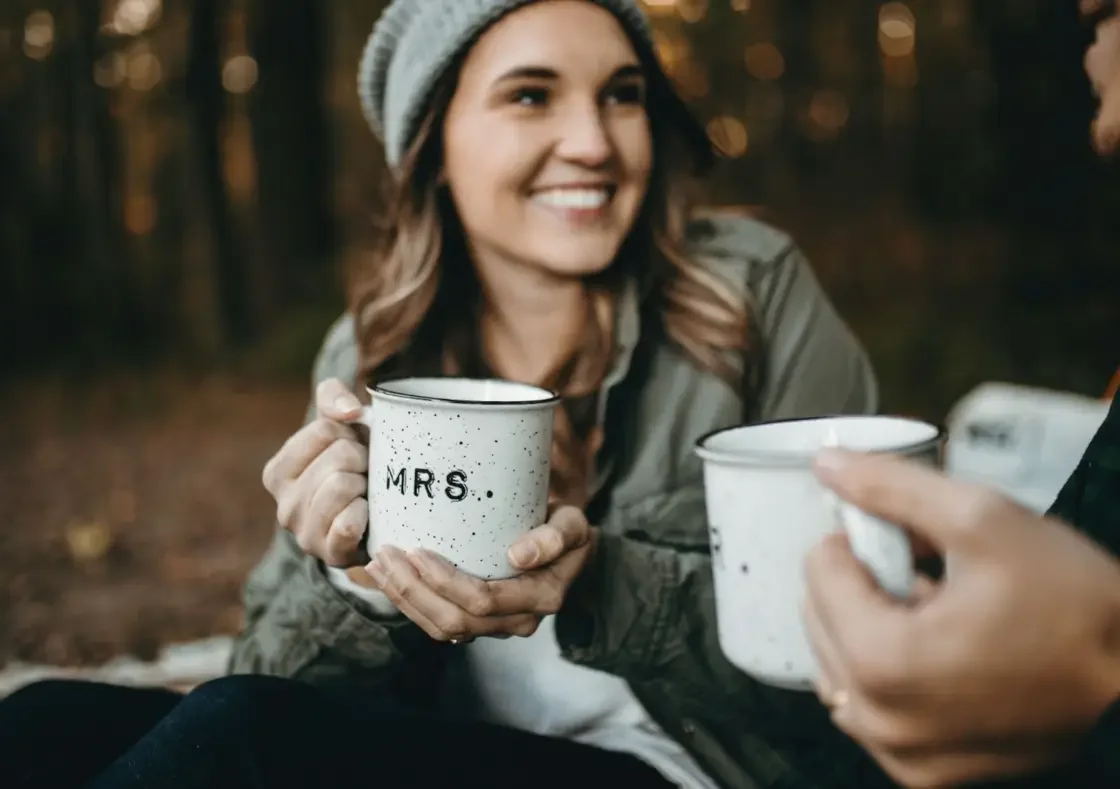 A woman holding a couple's cup - Liminality Professional Psychotherapist.webp