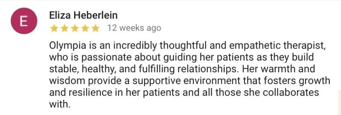  Google review for Olympia, praising her warmth, wisdom, and supportive environment as a therapist.
