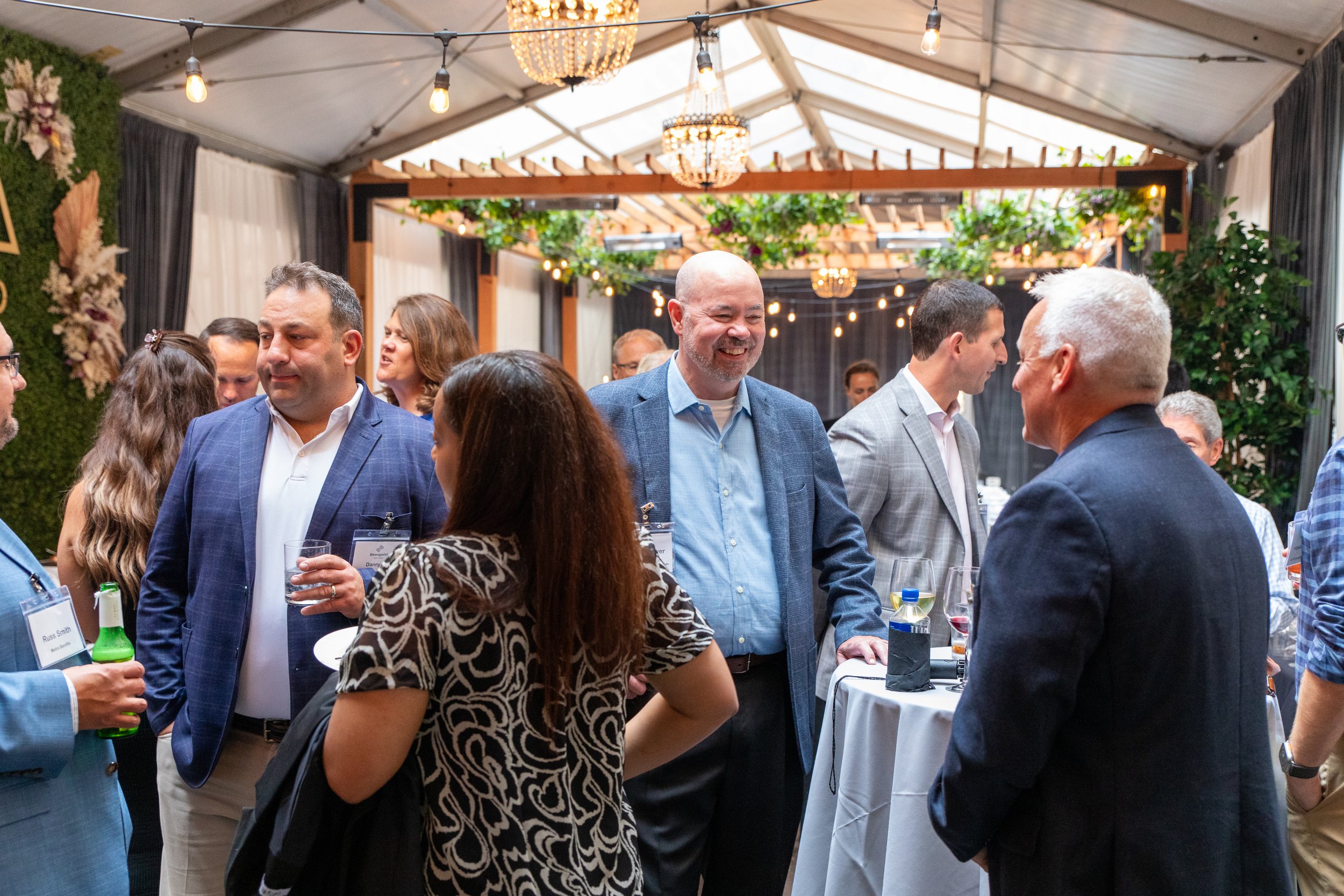 The team of Pension Financial Services (PFS) gathers and socializes.