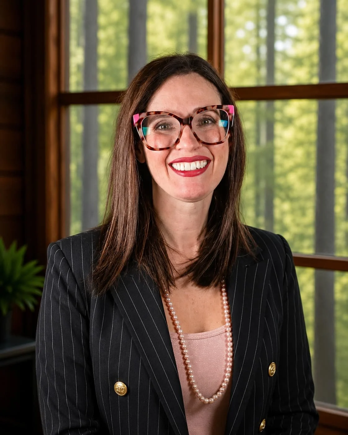 Ashley Lundberg, COO and co-founder of Awaken Financial Designs — flat-fee fiduciary financial planning firm serving Cary NC and Arizona, MSBL, Certified Yoga Teacher