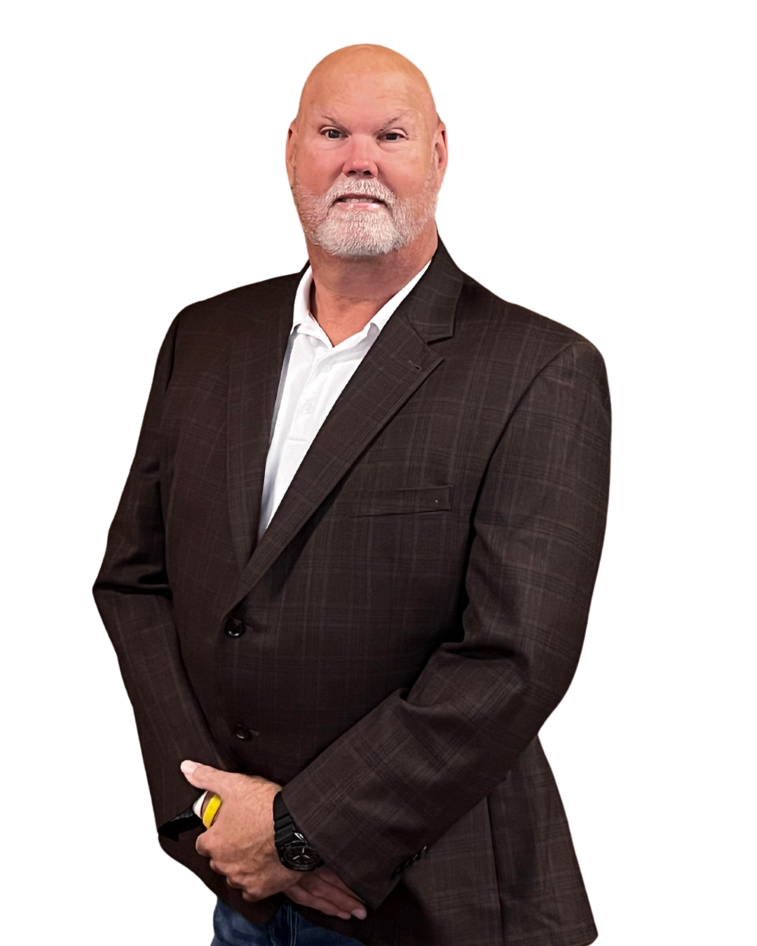 A middle-aged man with a beard and bald head, wearing a dark brown plaid suit jacket and a white dress shirt, standing against a plain white background.