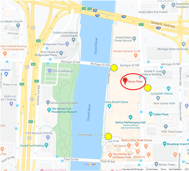 Map showing Devos Place in downtown Grand Rapids, Michigan, with surrounding streets, the Grand River, and nearby landmarks including Michigan State University, Gerald R. Ford Museum, and DeVos Performance Hall.