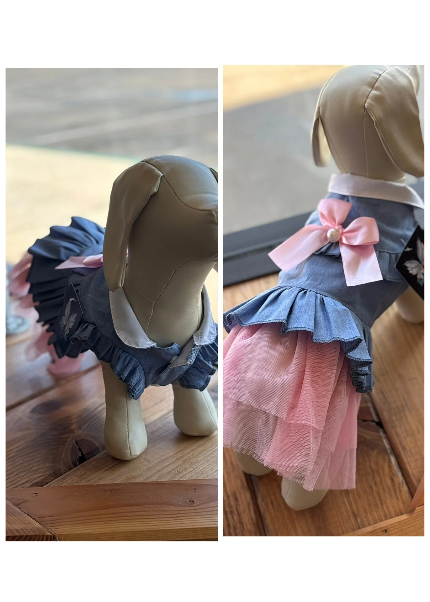 Two plush dog mannequins dressed in decorated outfits displayed on a wooden surface, one with a navy dress and pink bow, the other with a blue dress and pink tulle skirt.
