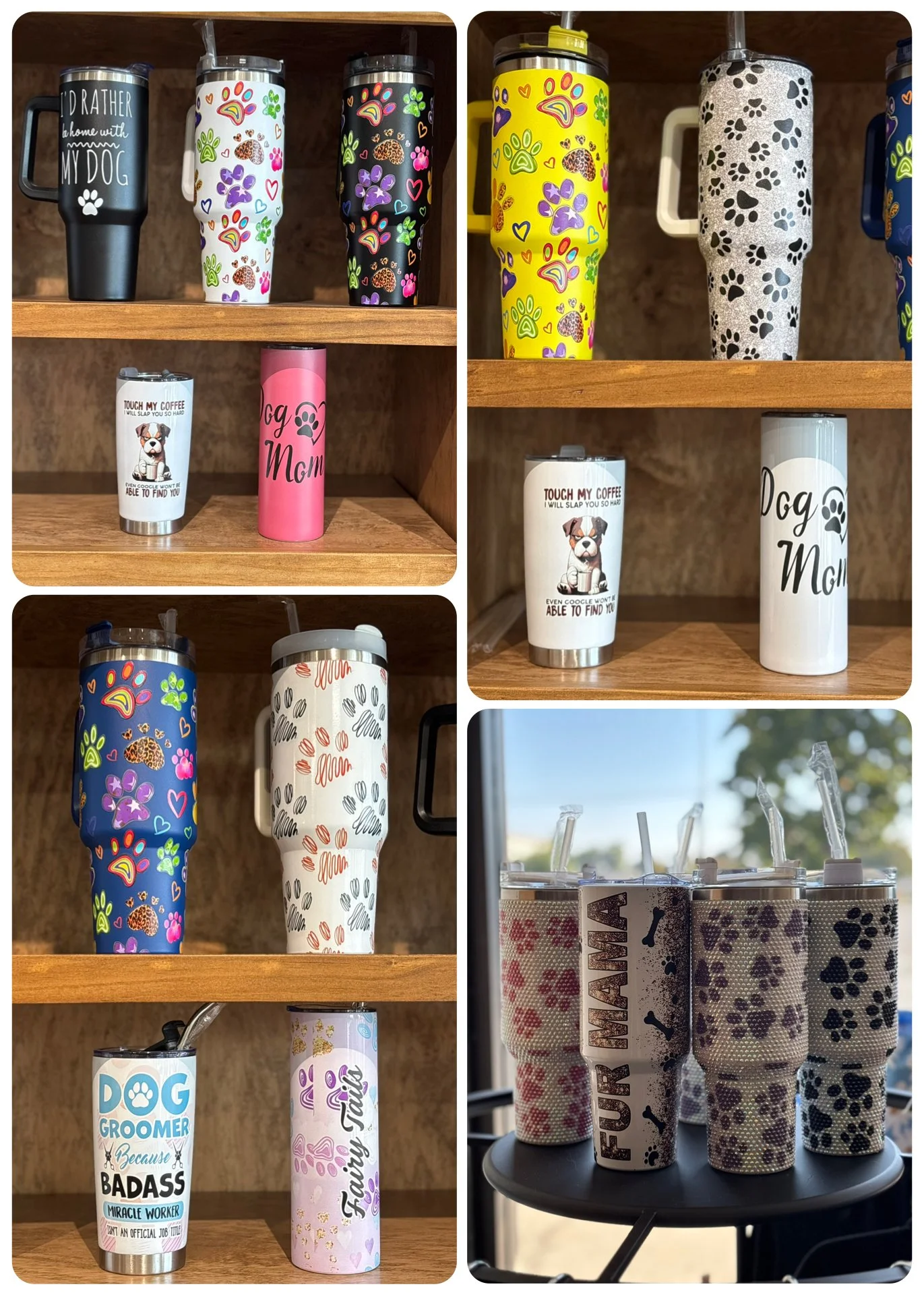 Collection of colorful dog-themed drink tumblers with various paw print and bone patterns displayed on wooden shelves and a table.