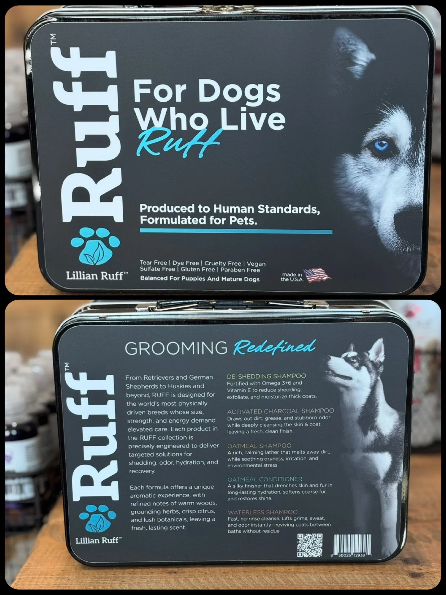 A metal tin box for dog grooming and pet care products, featuring branding for Lillian Ruff. The top part of the box displays the slogan "For Dogs Who Live Ruff," with a partial image of a Siberian Husky. The front side highlights the brand's commitment to high standards for pets, with details about the product line, including tear-free, dye-free, cruelty-free, vegan, sulfate-free, gluten-free, and paraben-free ingredients, and claims the products are balanced for puppies and mature dogs. The back side describes the grooming products, such as de-shedding shampoo fortified with Omega 3+6 and Vitamin E, activated charcoal shampoo, oatmeal shampoo, oatmeal conditioner, and waterless shampoo, emphasizing natural ingredients and benefits for dog coat and skin health.