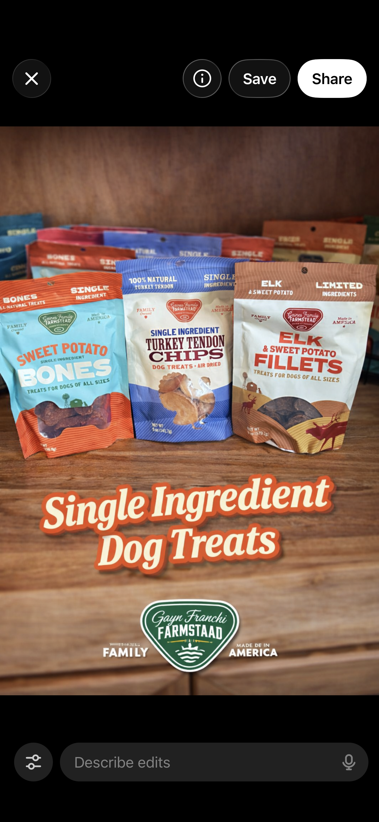 Three packages of single-ingredient dog treats on a wooden surface, including sweet potato bones, turkey tendon chips, and elk fillets, with a label reading 'Single Ingredient Dog Treats' and a Farmstaad logo.