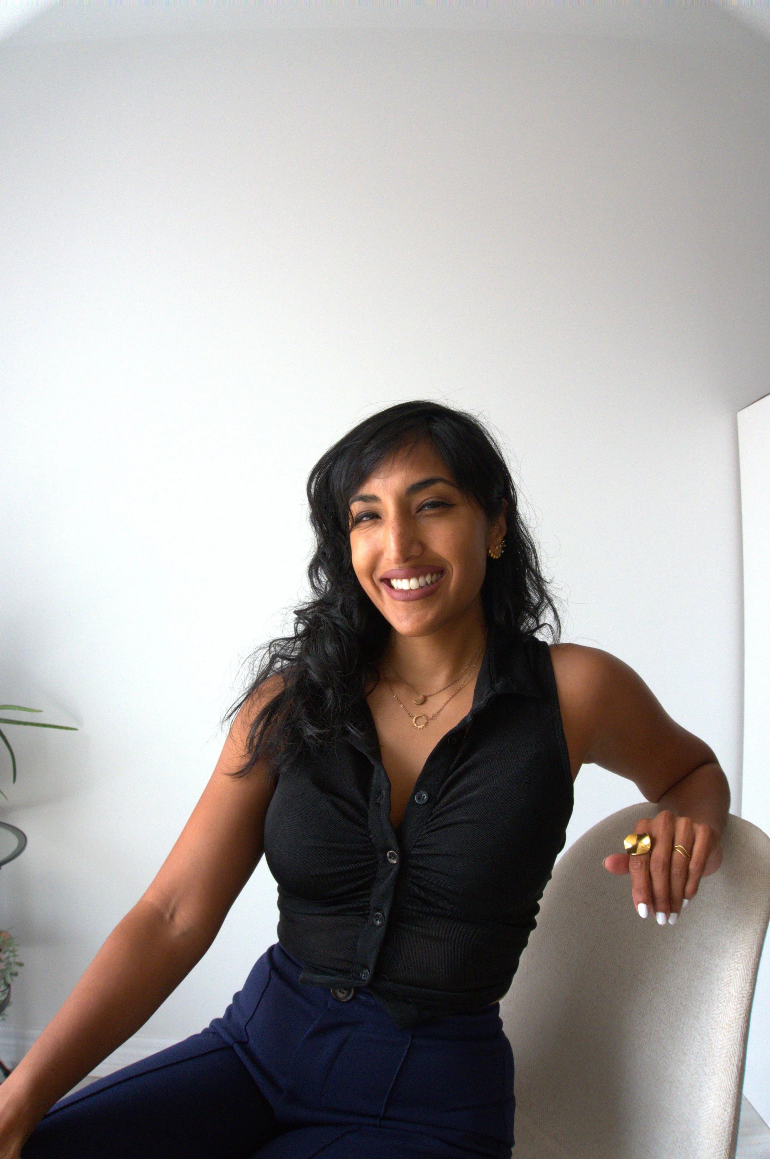 Woman In Black Shirt Smiling