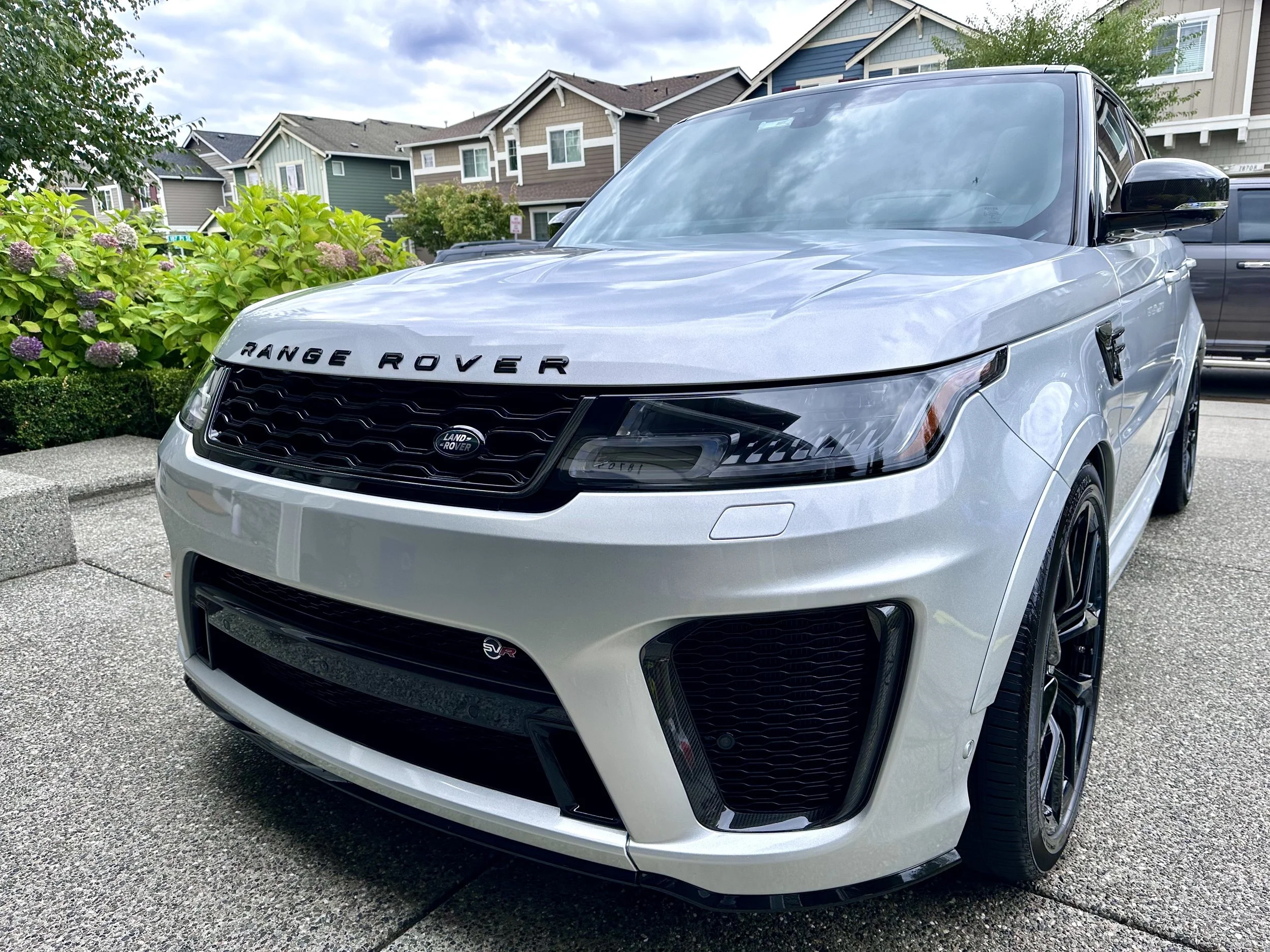 Before and after paint correction and polishing on a silver SUV by Burdys Auto Detail in Woodinville WA.