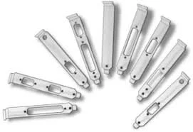 Set of ten metal utility knife blades arranged in a semi-circle.