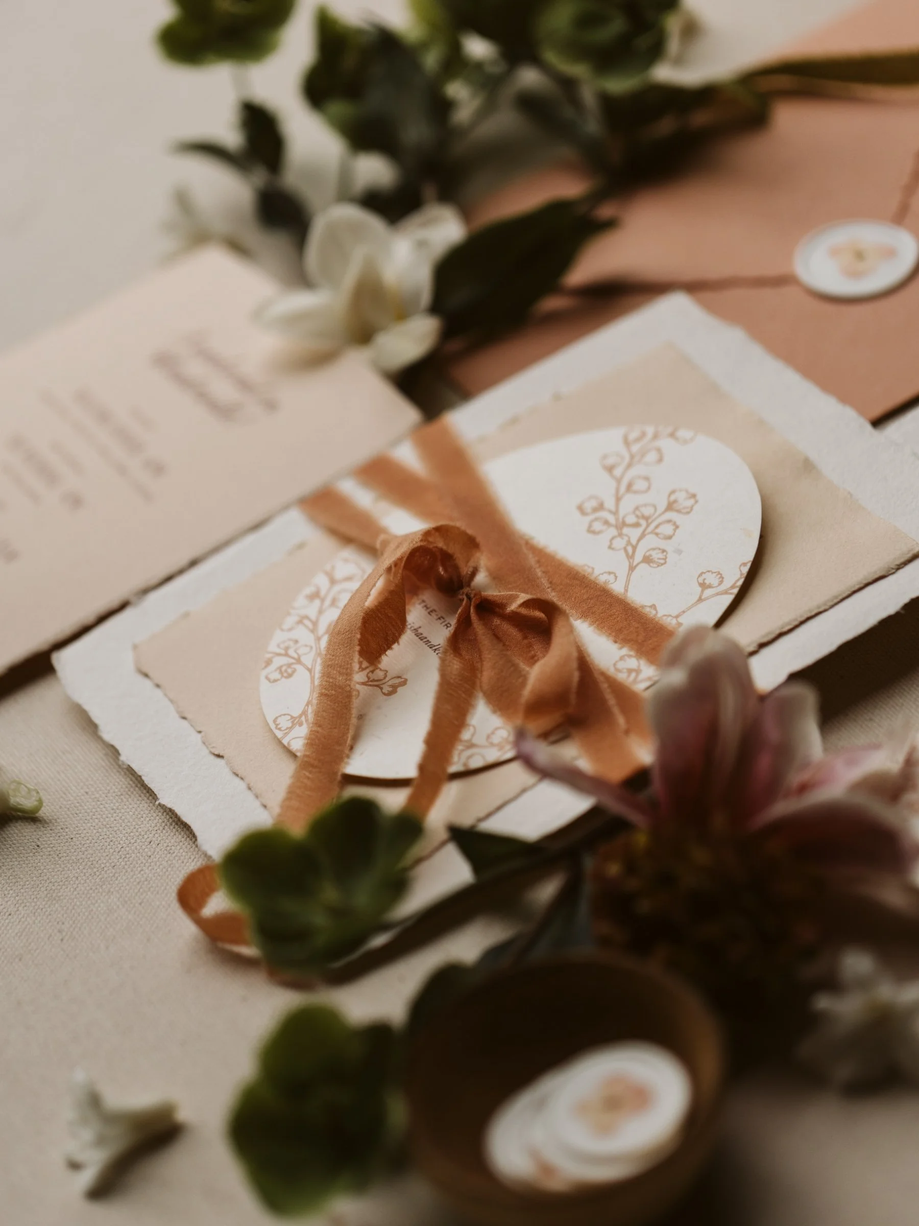 silk-ribbon-handmade-paper-wedding-invitations.jpg
