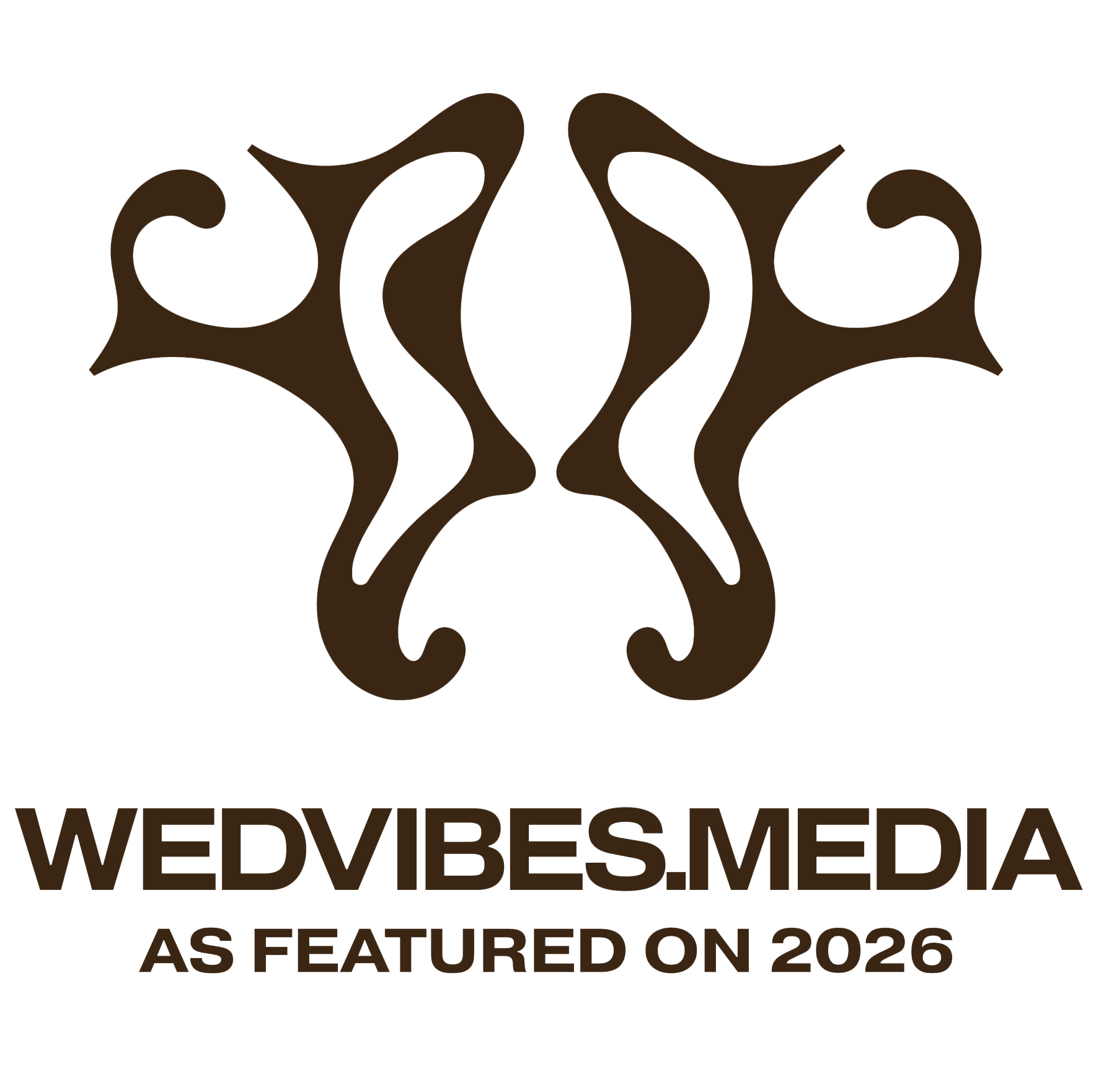 Illustration of a stylized butterfly with symmetrical, swirling wings in shades of brown and black, with the text "WEDV BESO MEDIA" below.