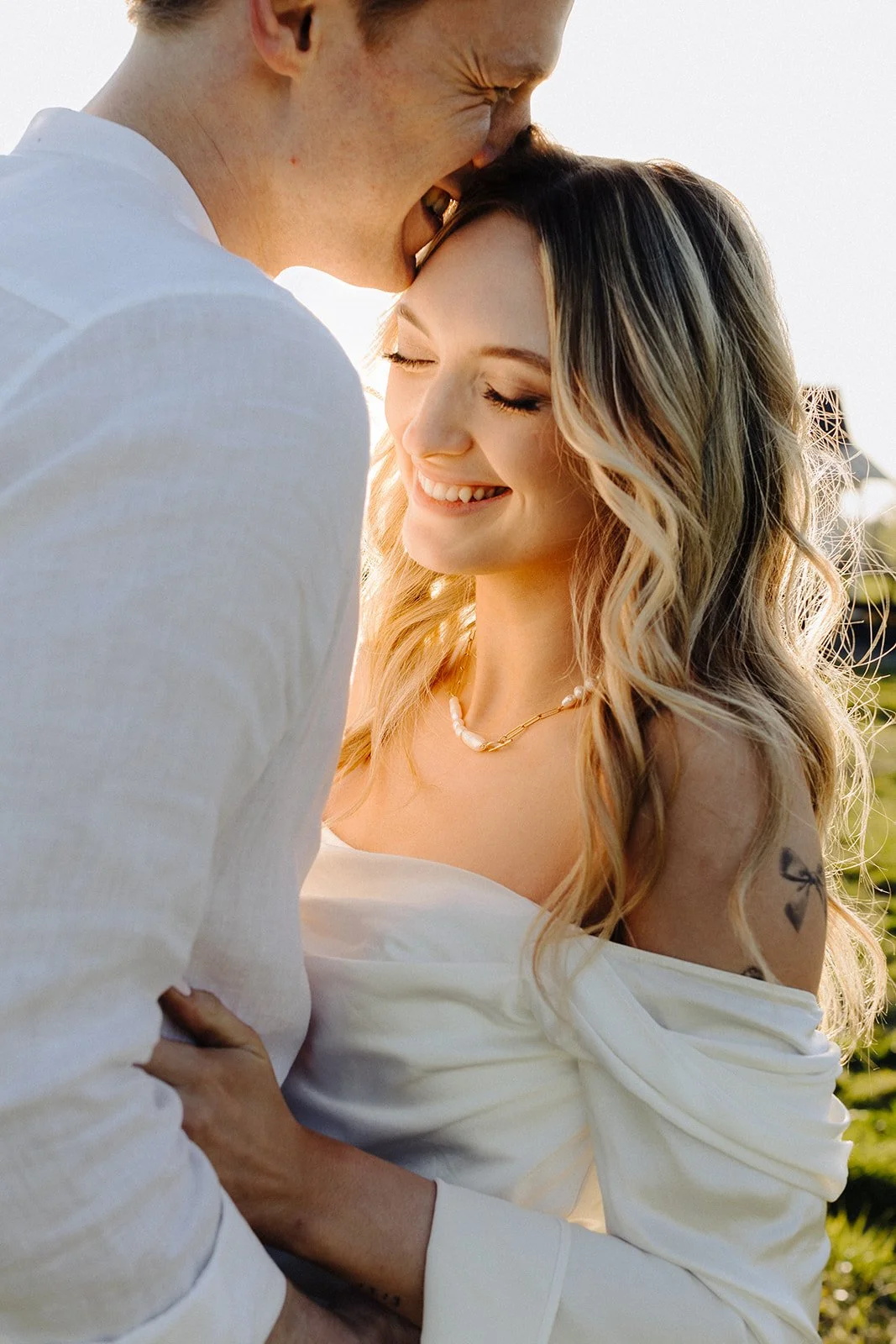 Bride and groom portrait at golden hour