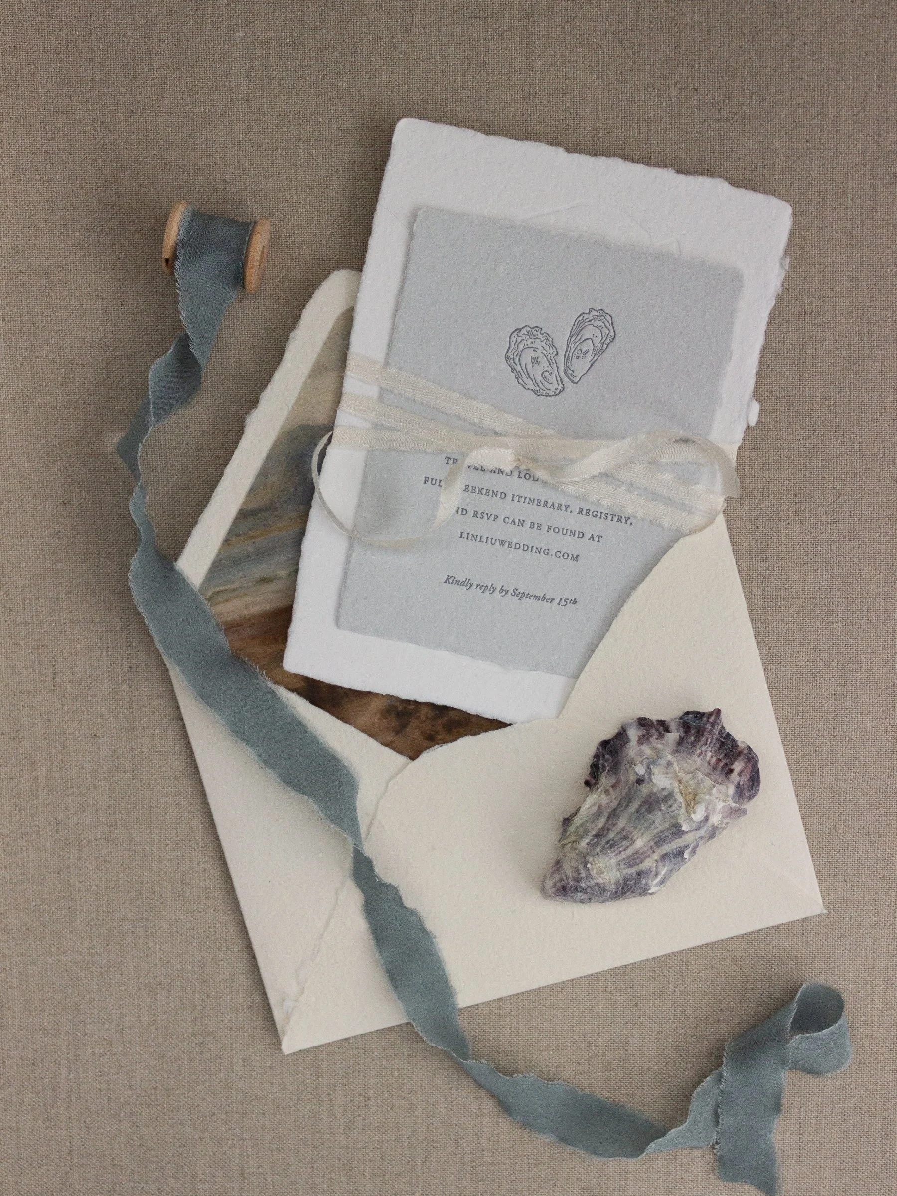 oyster-shell-wedding-invitation-handmade-paper.jpg