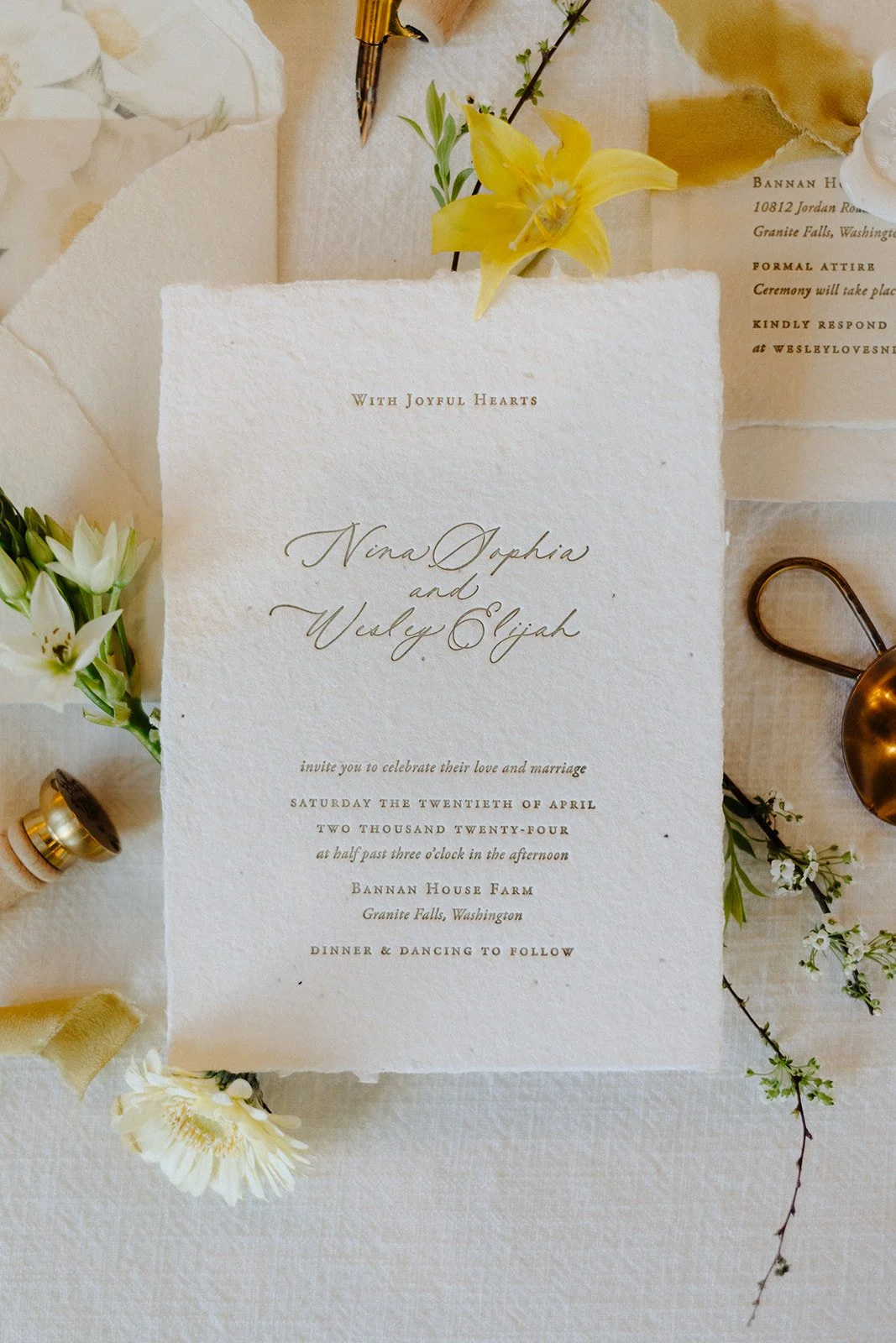 Letterpress wedding invitation on deckled edge paper