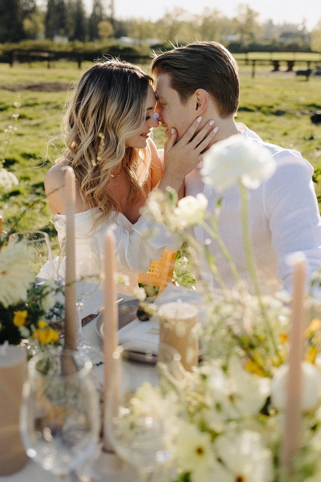 Bride and groom at wedding reception table