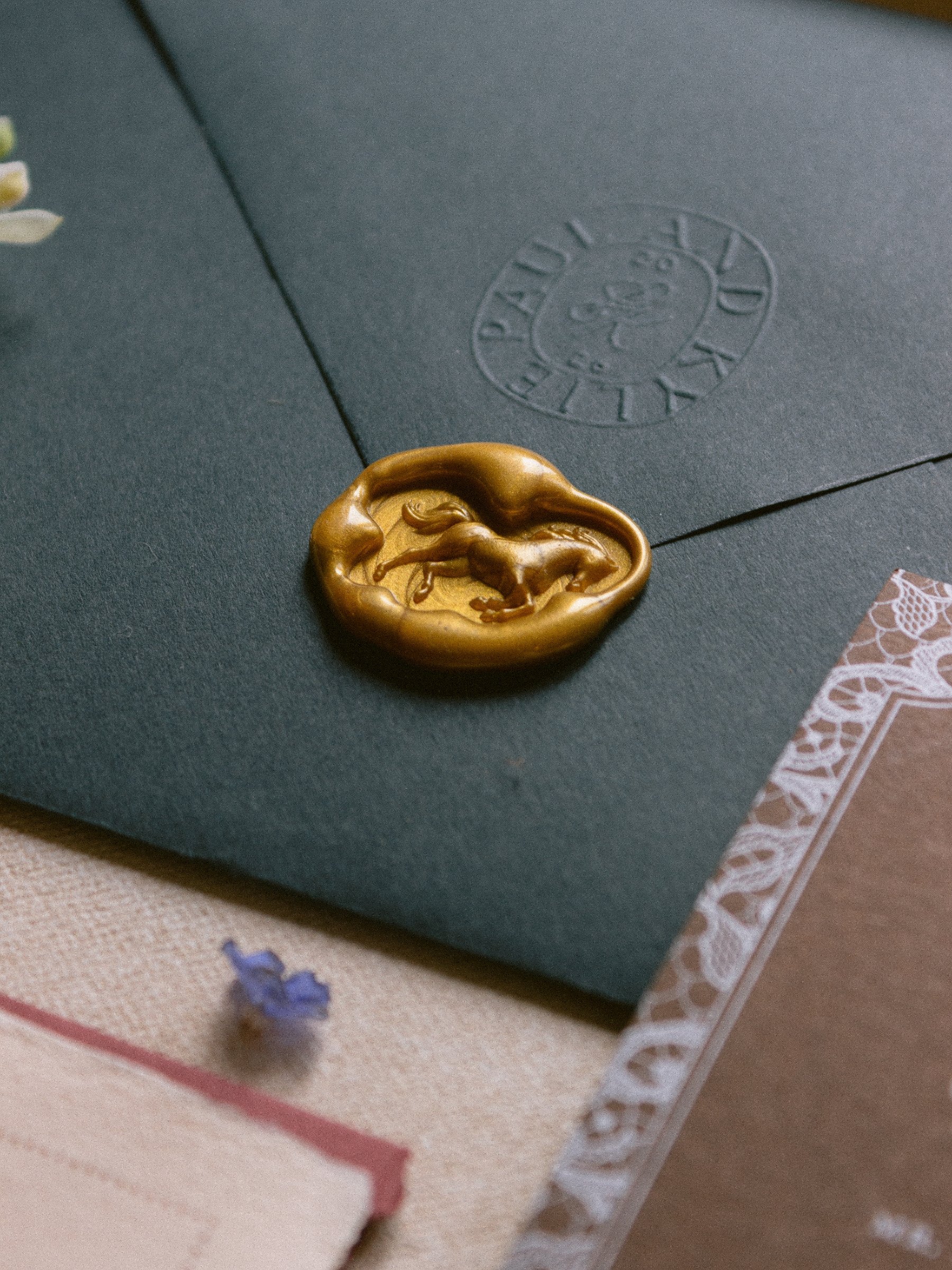horse-wax-seal-embossed-envelope-ralph-lauren-wedding.jpg