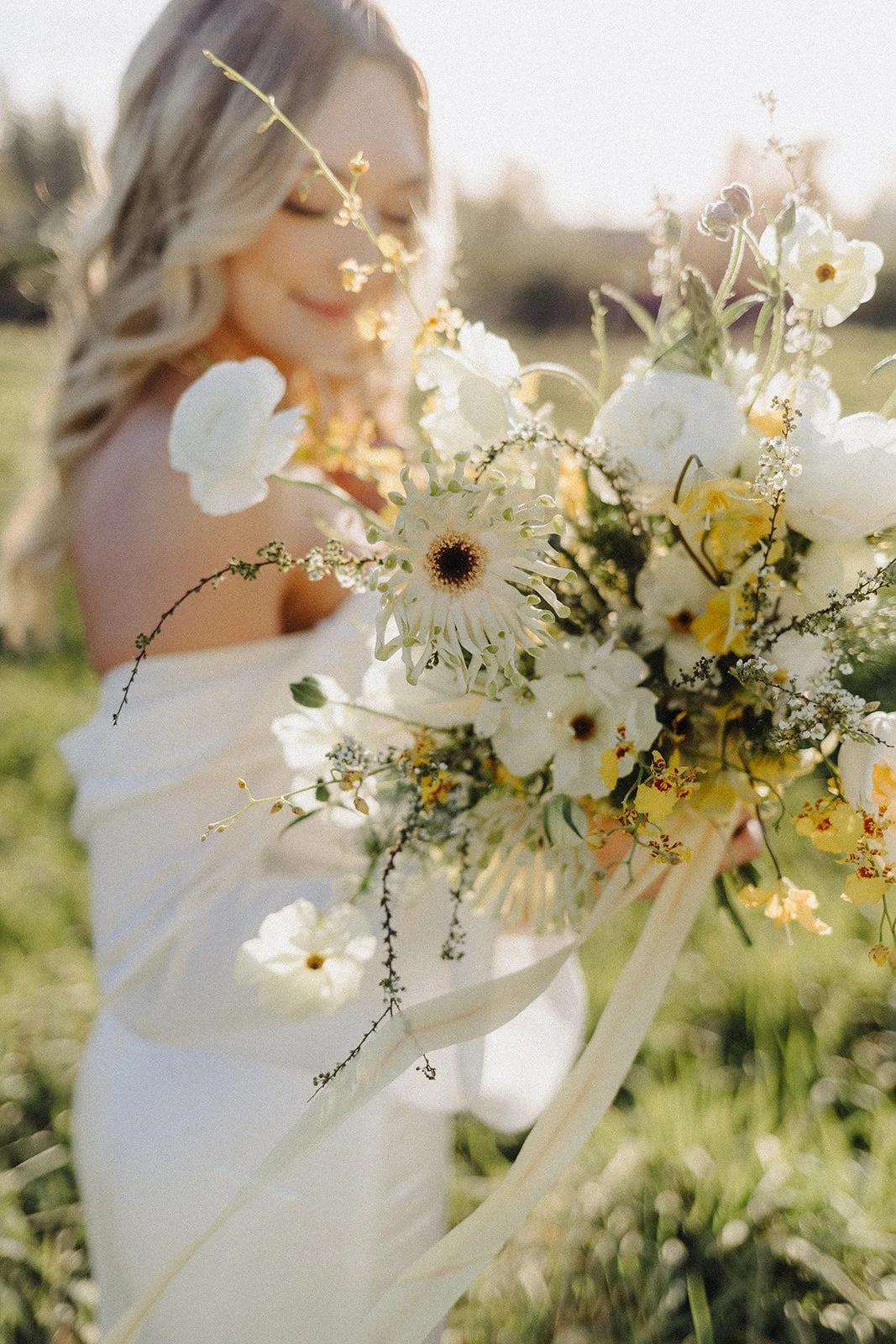 Bridal bouquet with yellow and white flowers