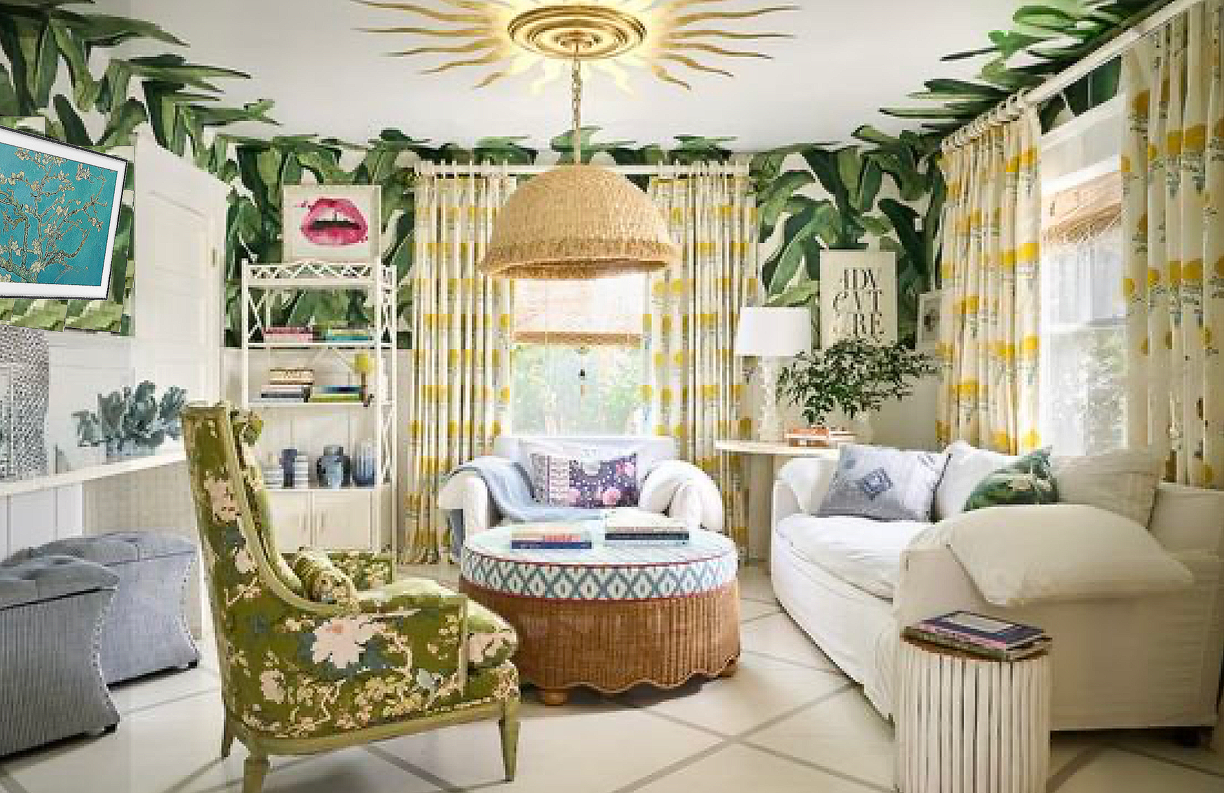 Bright living room with green leafy wallpaper, yellow and white patterned curtains, and a white sofa with pillows. A round wicker coffee table with books on top sits in front of the sofa. An armchair with green floral upholstery and carved wood frame
