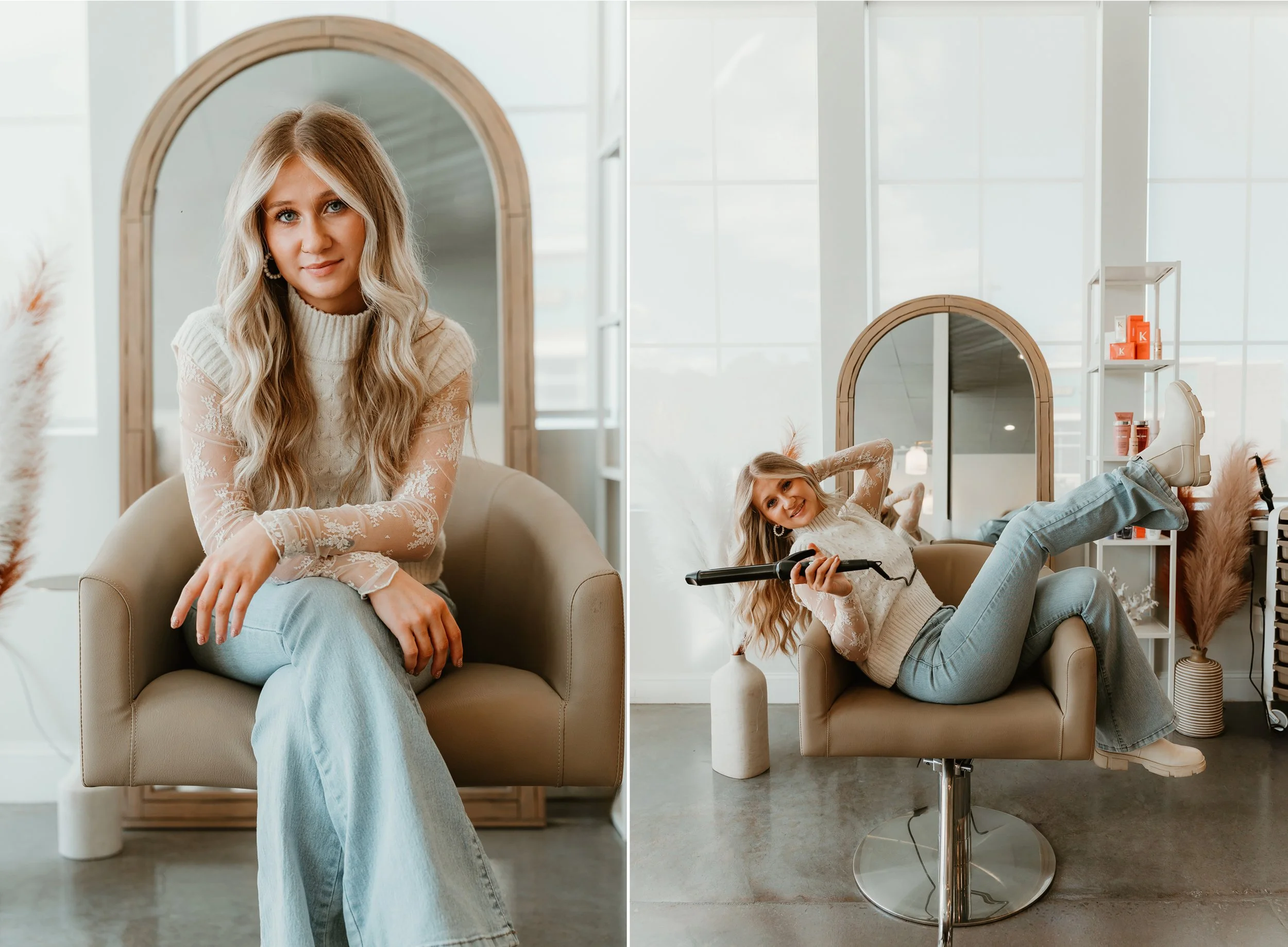 A young woman with long blonde hair sits on a beige chair in front of a large mirror, wearing a white lace long-sleeve top and light blue jeans. In the second part of the image, she is lying relaxed on the same chair, holding a curling iron, smiling, with her legs extended and feet resting on a tall white shelf filled with hair and beauty products, in a bright, modern salon or studio setting.