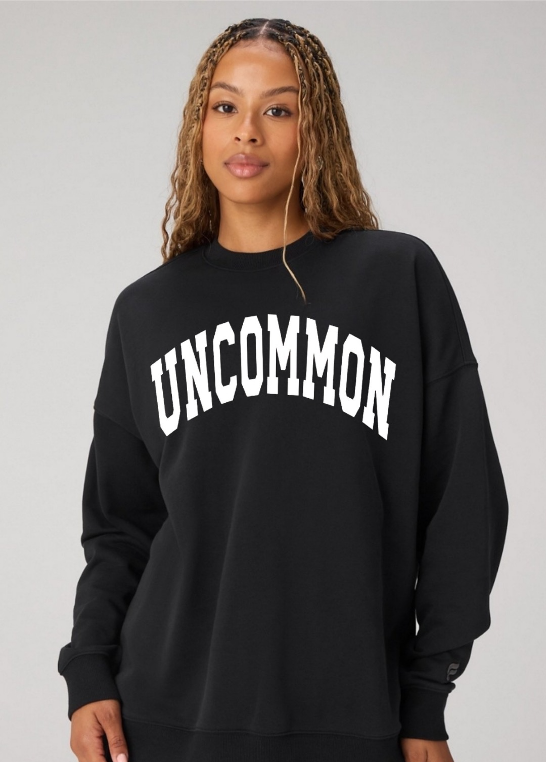 uncommon black crew neck female.png