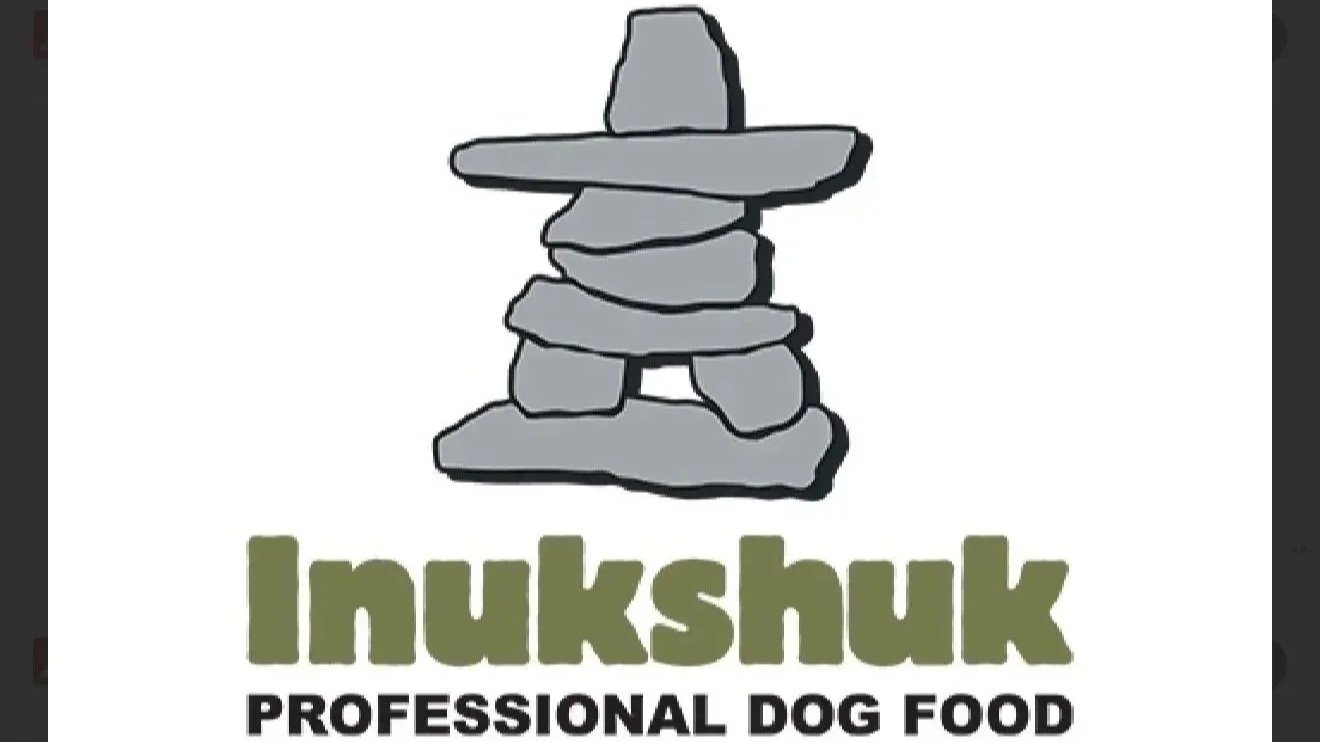 Logo with a drawing of stacked rocks and the text "Inukshuk" and "Professional Dog Food".