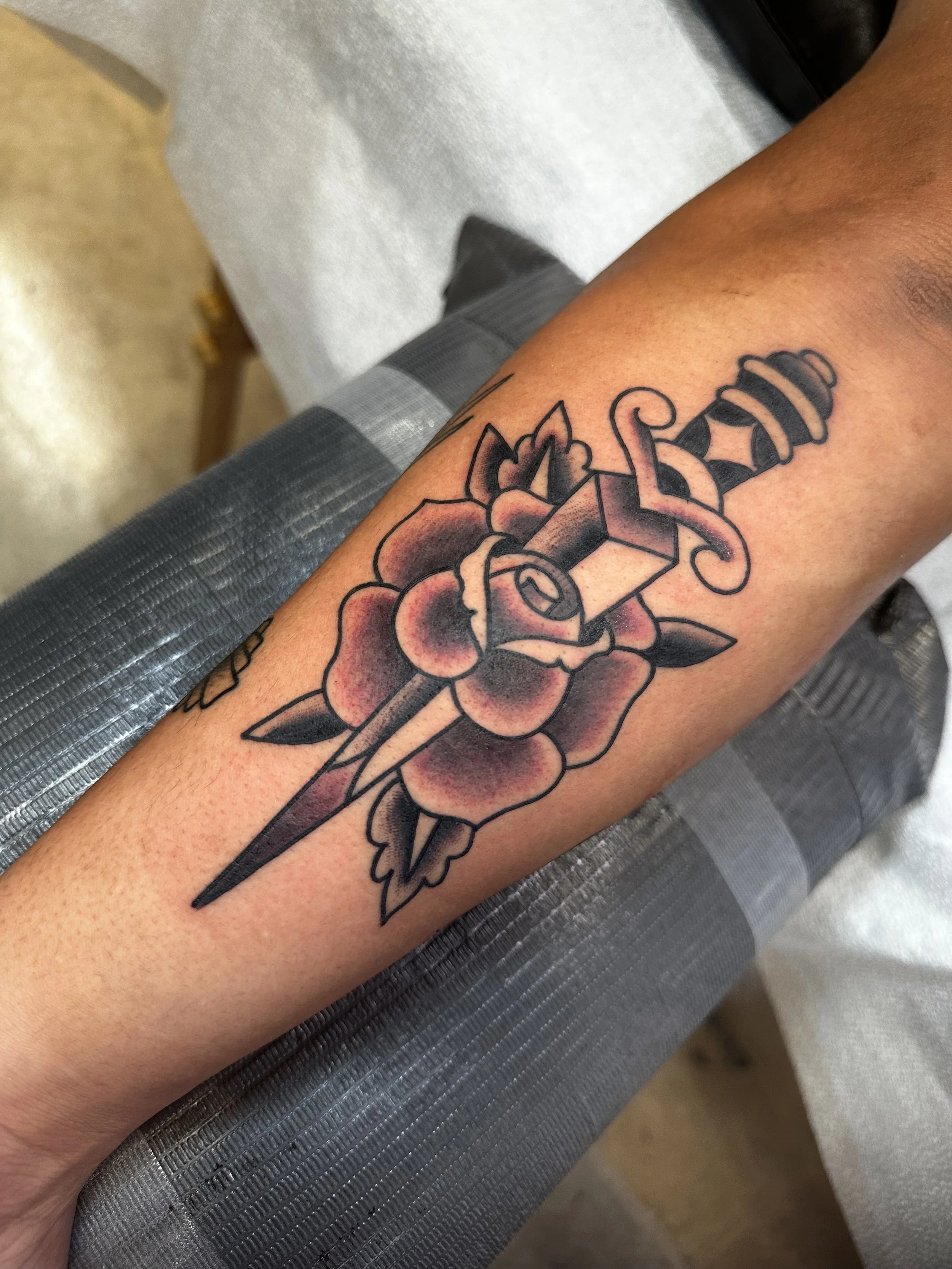 Black and grey traditional tattoo by Jeff Young in San Diego, CA