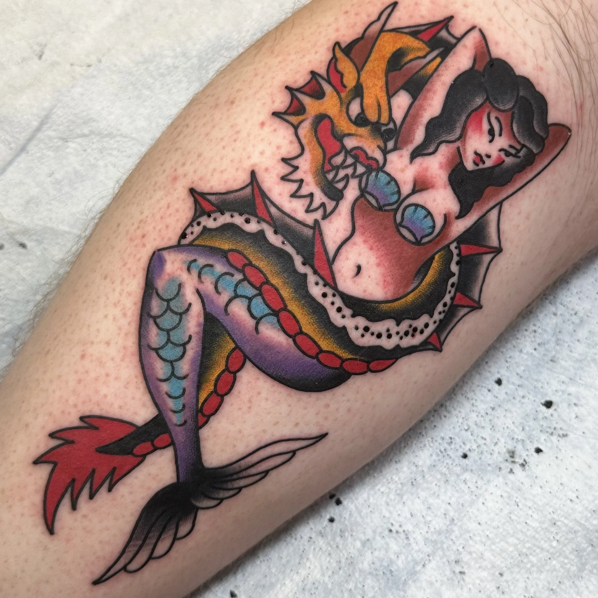 Traditional pinup tattoo by Jeff Young in San Diego, CA