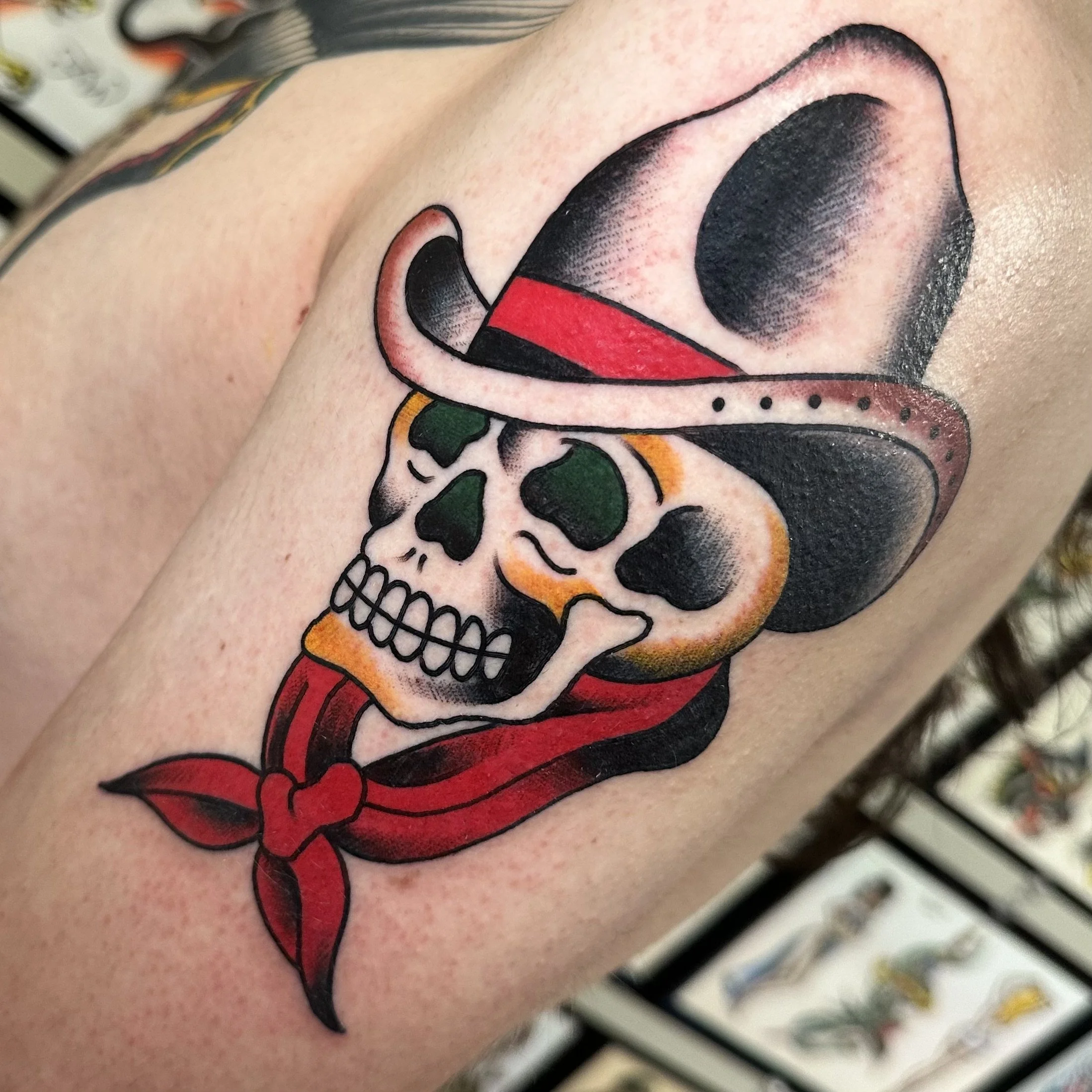 Skull tattoo by traditional tattoo artist Jeff Young in San Diego, CA