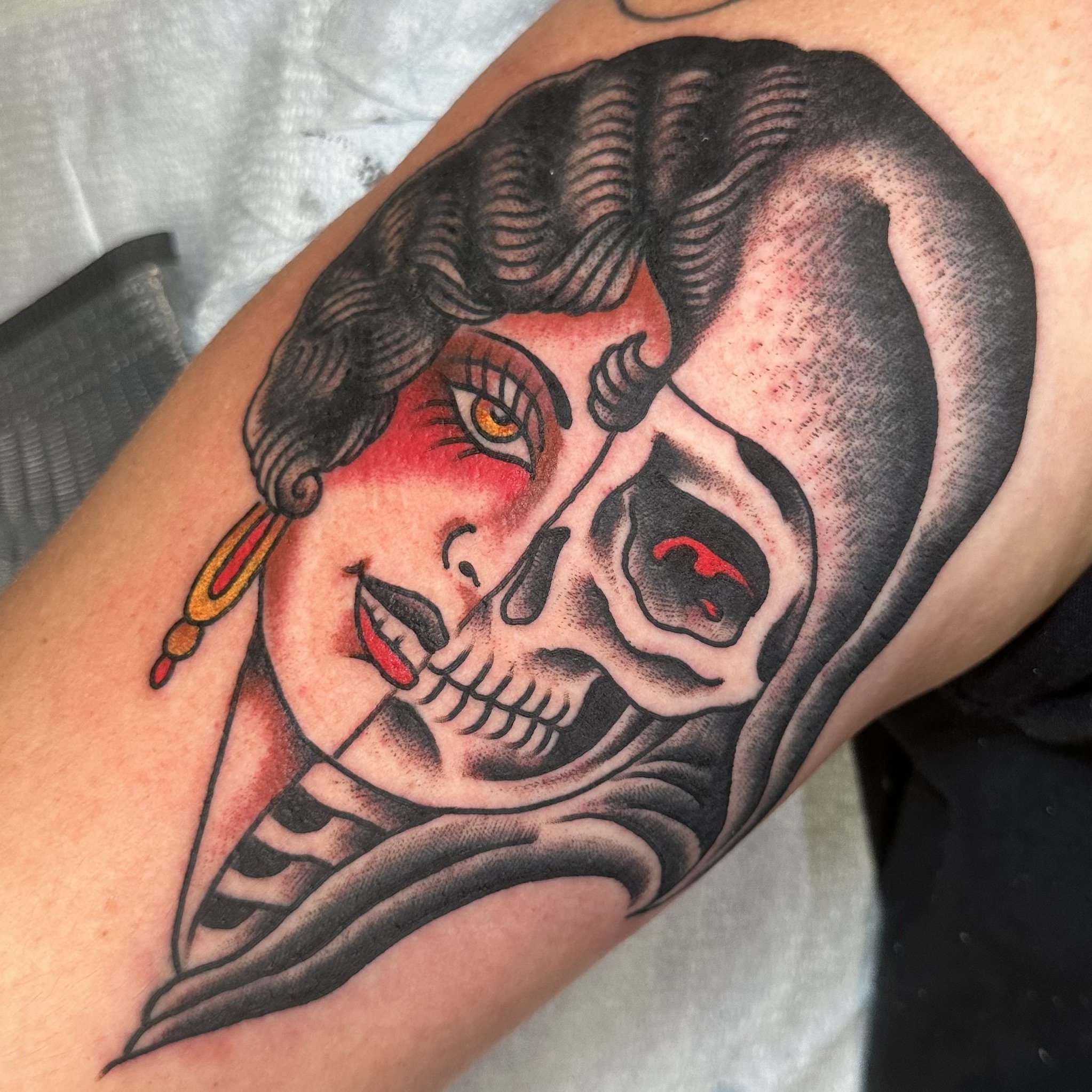 Ladyhead tattoo by traditional tattoo artist Jeff Young in San Diego, CA