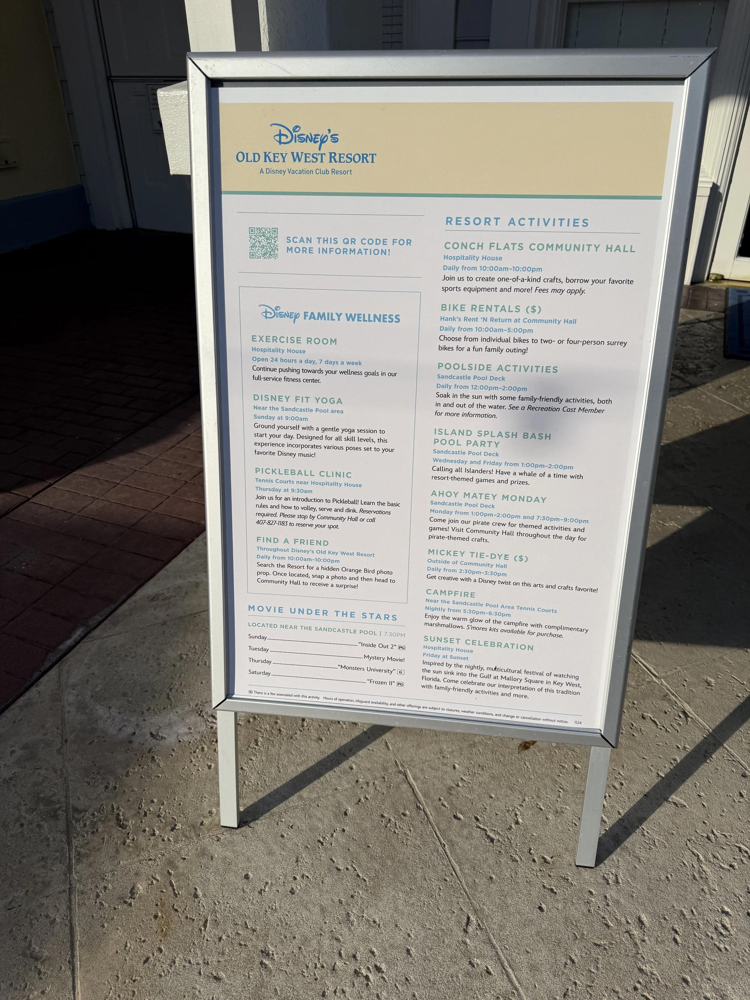 Information board for Disney's Old Key West Resort listing resort activities, including events at the Conch Flats Community Hall, bike rentals, poolside activities, island splash bash, pirate-themed Monday, tie-dye craft, campfire, sunset celebration