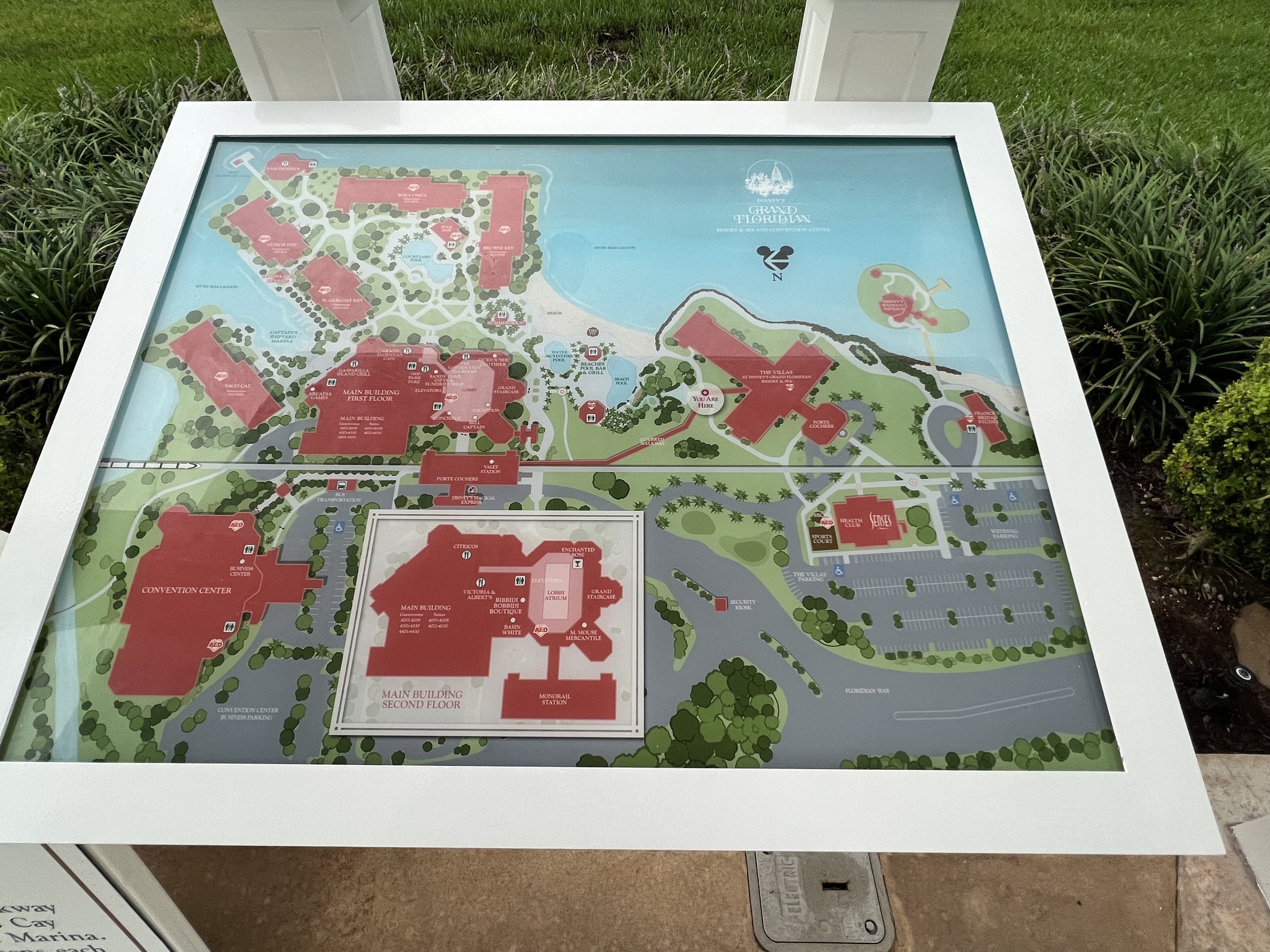 A detailed map of the Grand Floridian Resort & Spa at Walt Disney World, showing various buildings, pathways, parking lots, lakes, and natural areas within the resort.