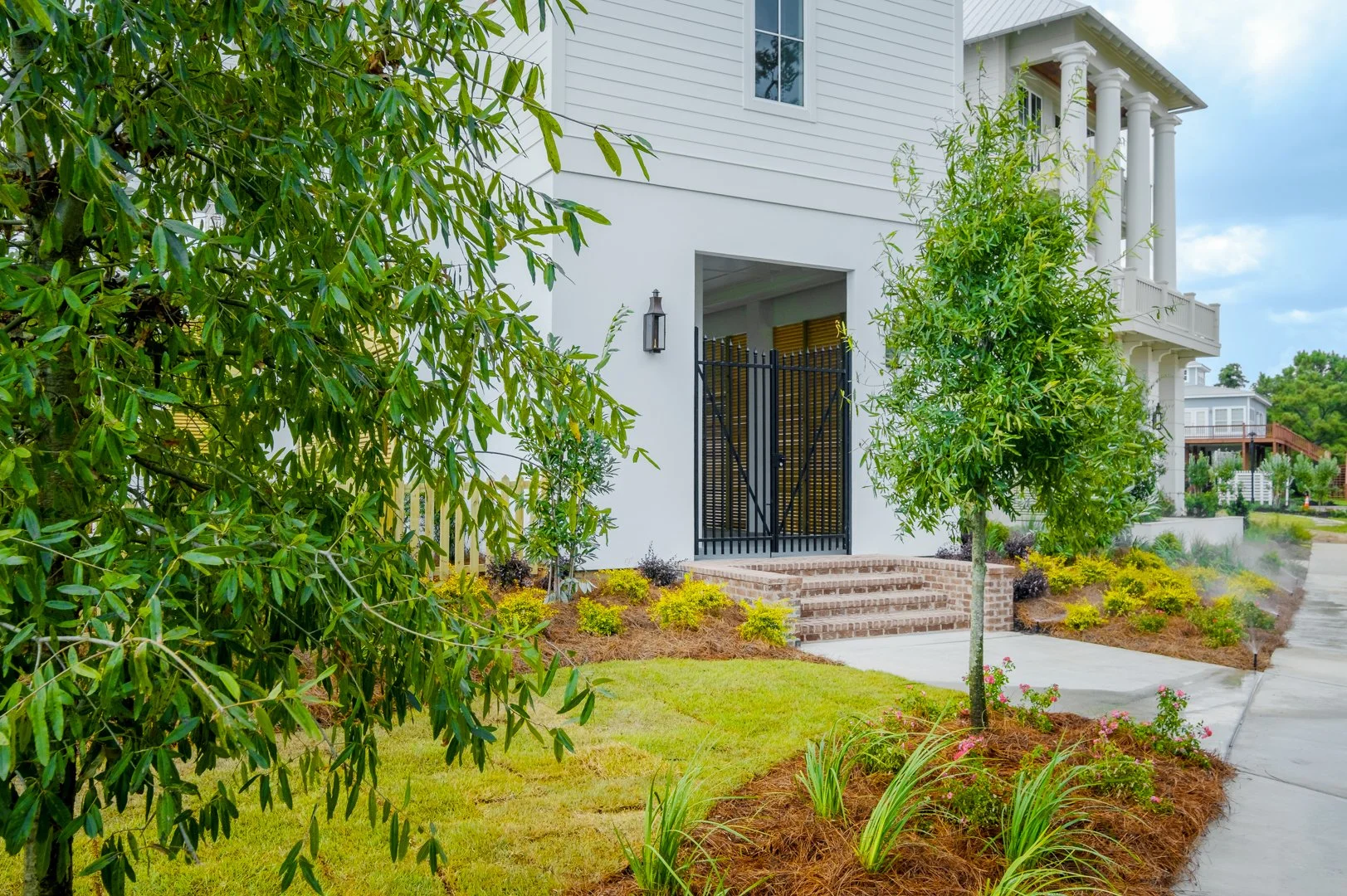 Landscaped community grounds at The Sands at Front Beach in Ocean Springs
