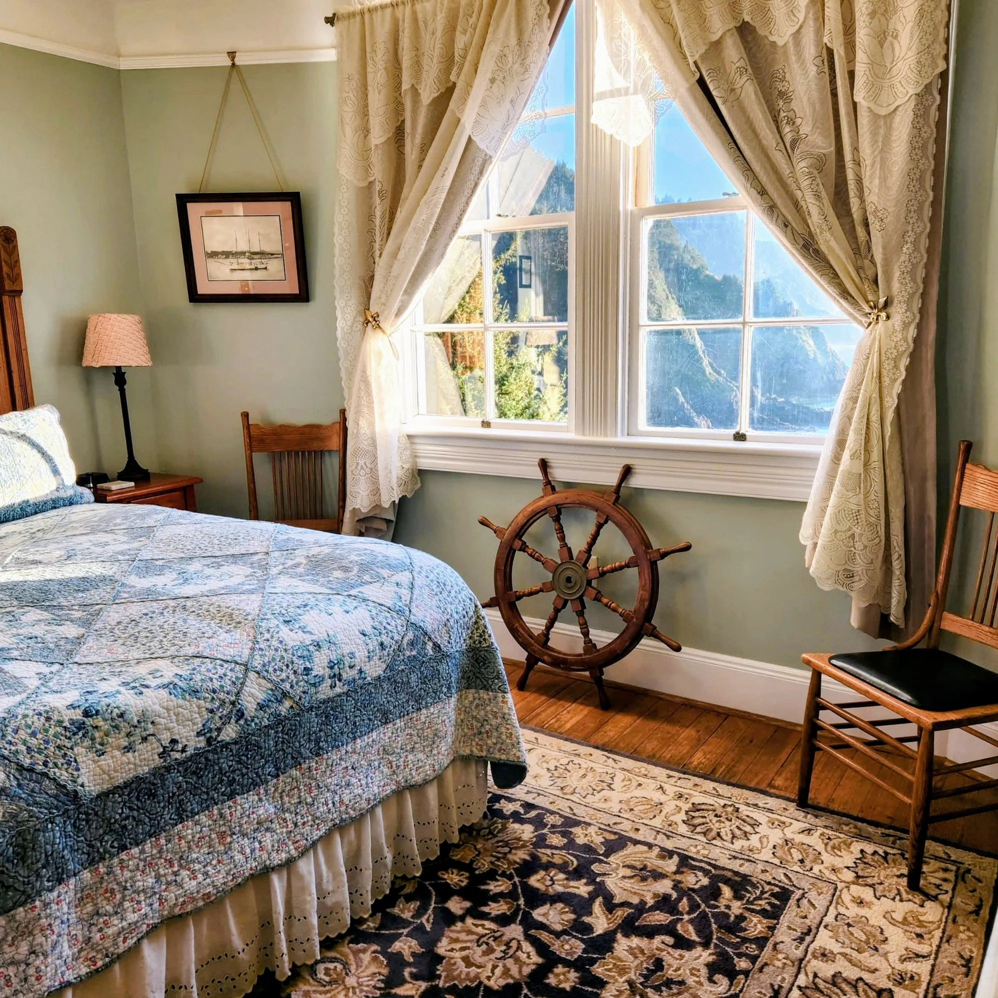 Beautiful Green bedroom with white trim decorated with a nautical theme