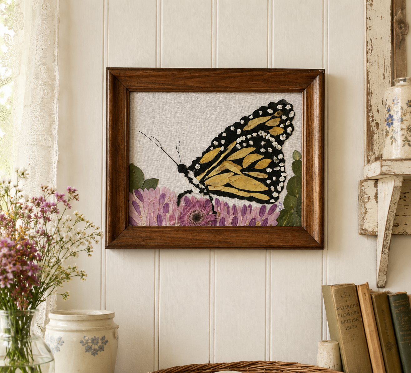 Pressed wildflower botanical artwork in antique frame